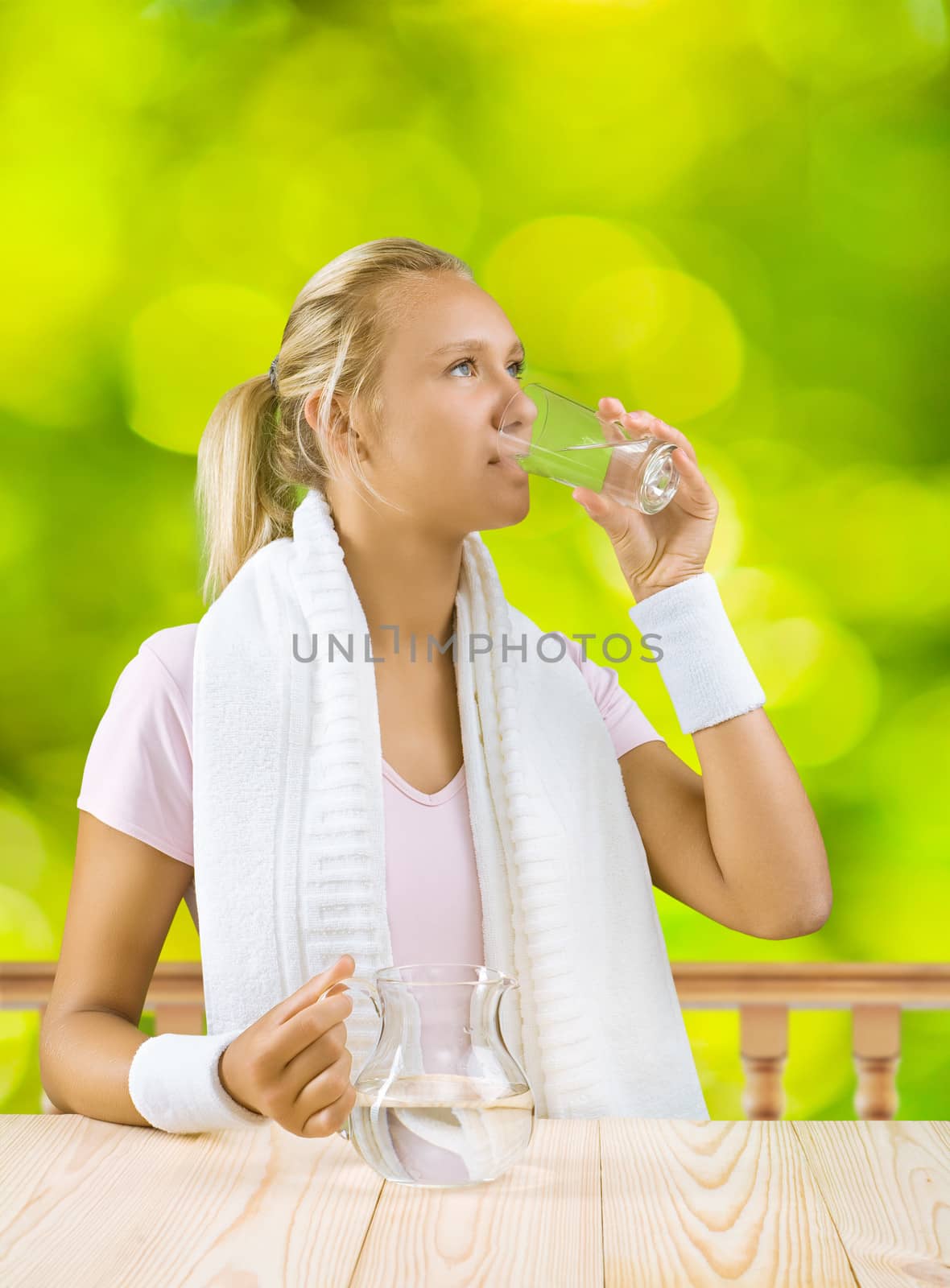 a girl drinking water by mihalec