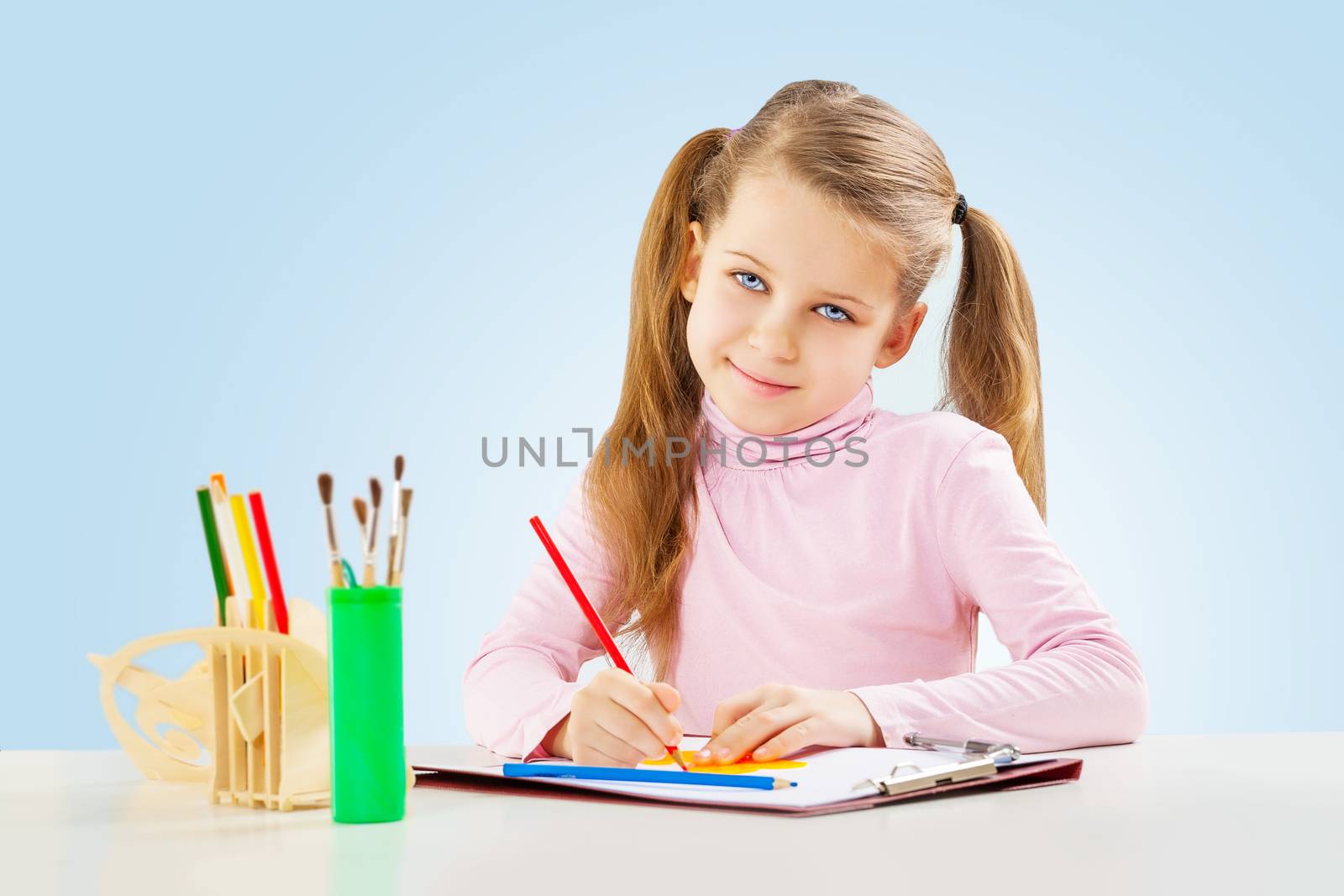 a little girl at table by mihalec