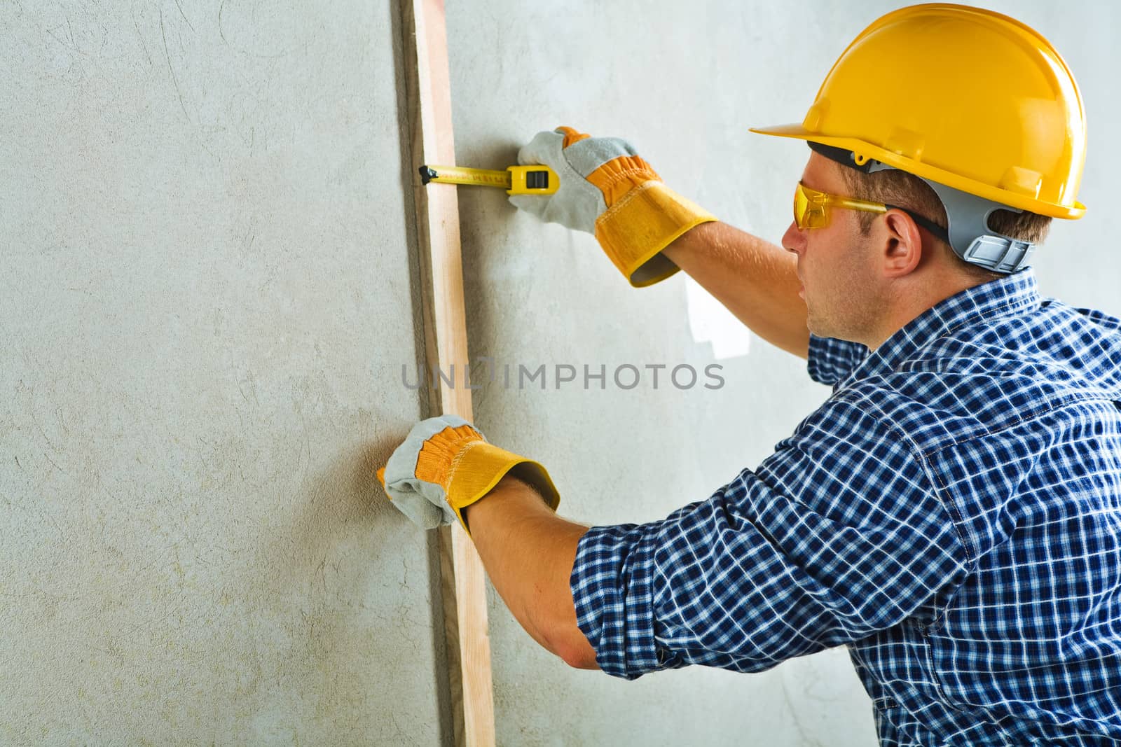 a worker measuring