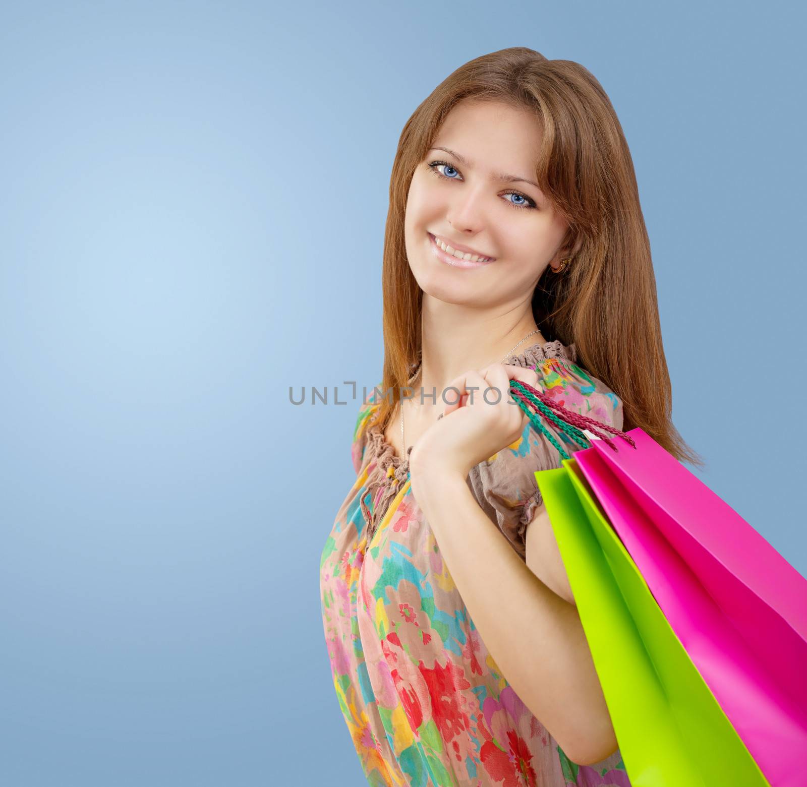 a young girl with paper bags