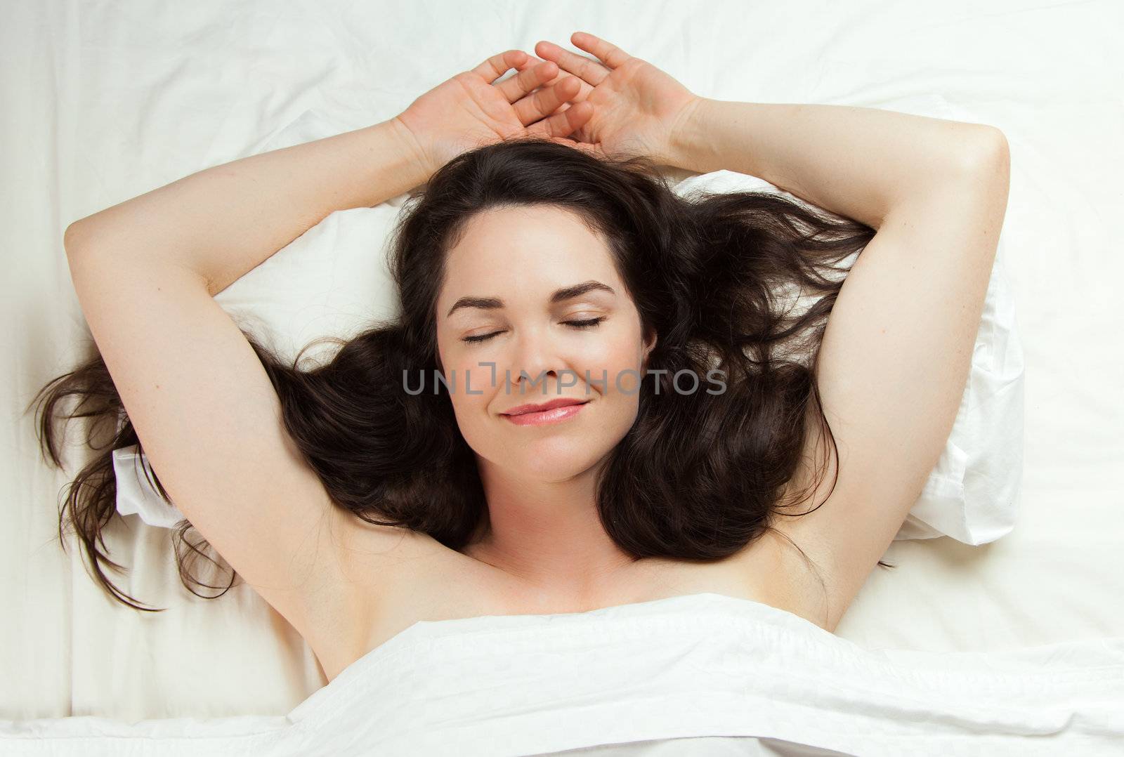 Beautiful relaxed young woman sleeping peacefully.