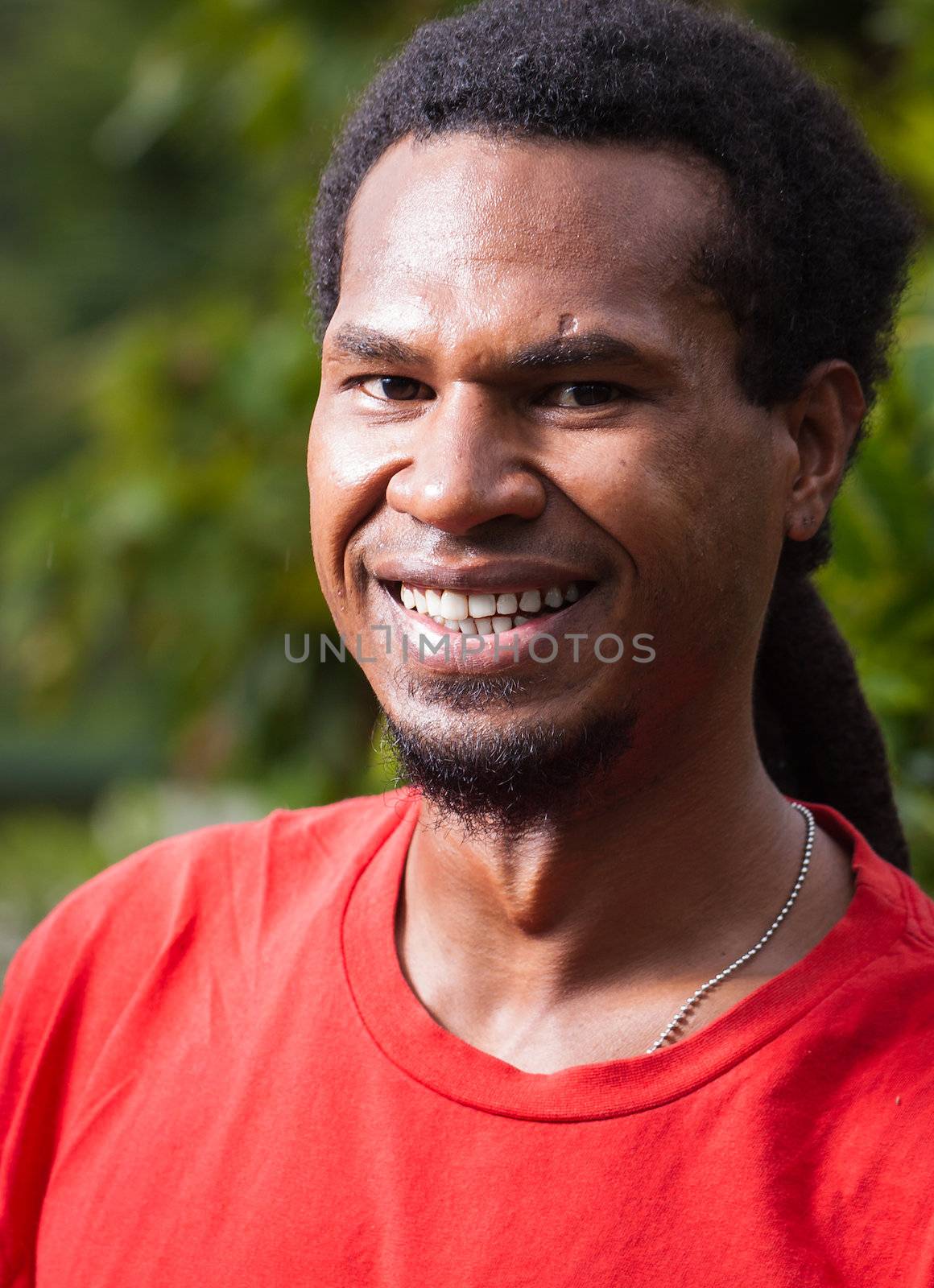 Portrait of happy man from Papua New Guinea by Jaykayl