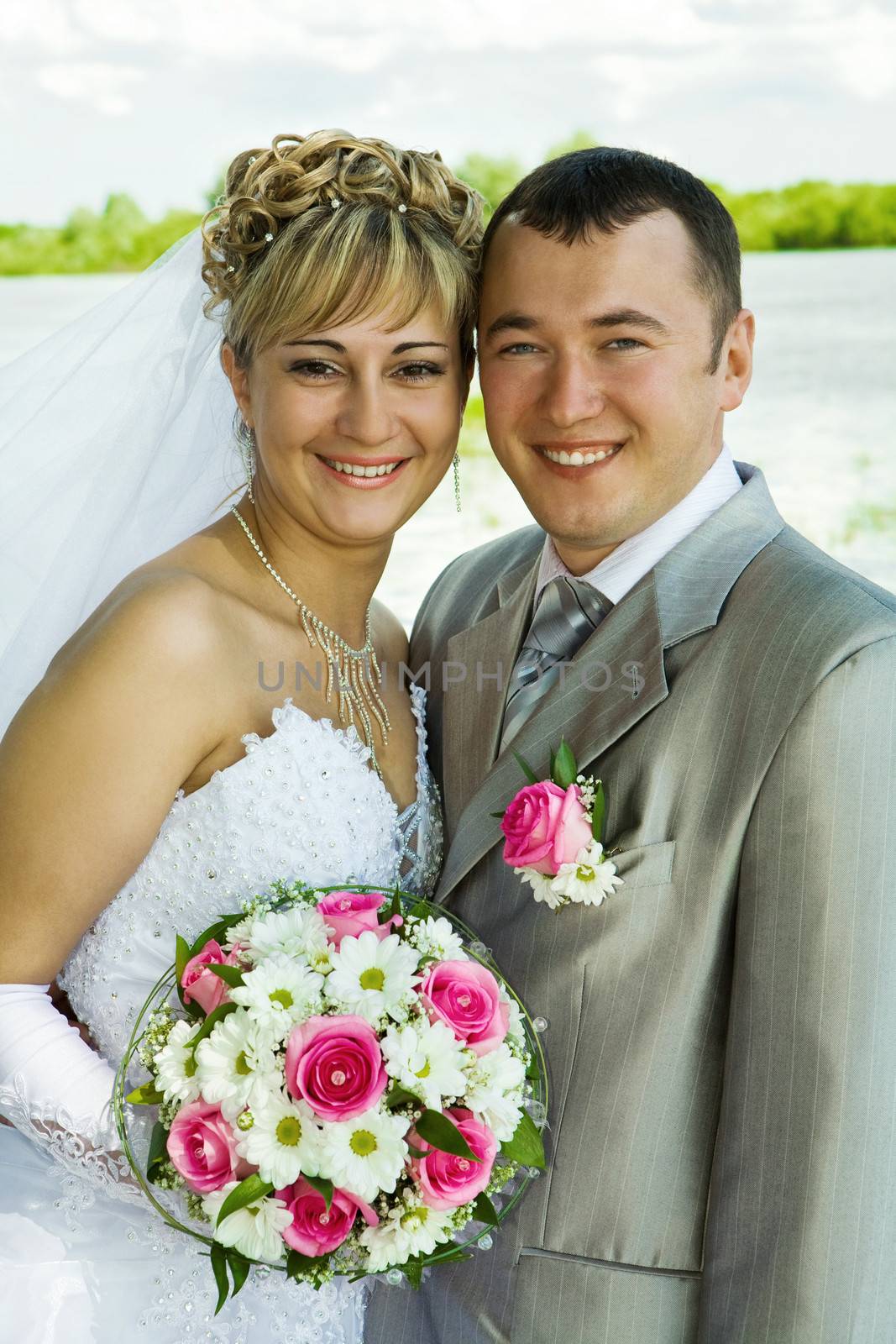 bride and groom on a nature