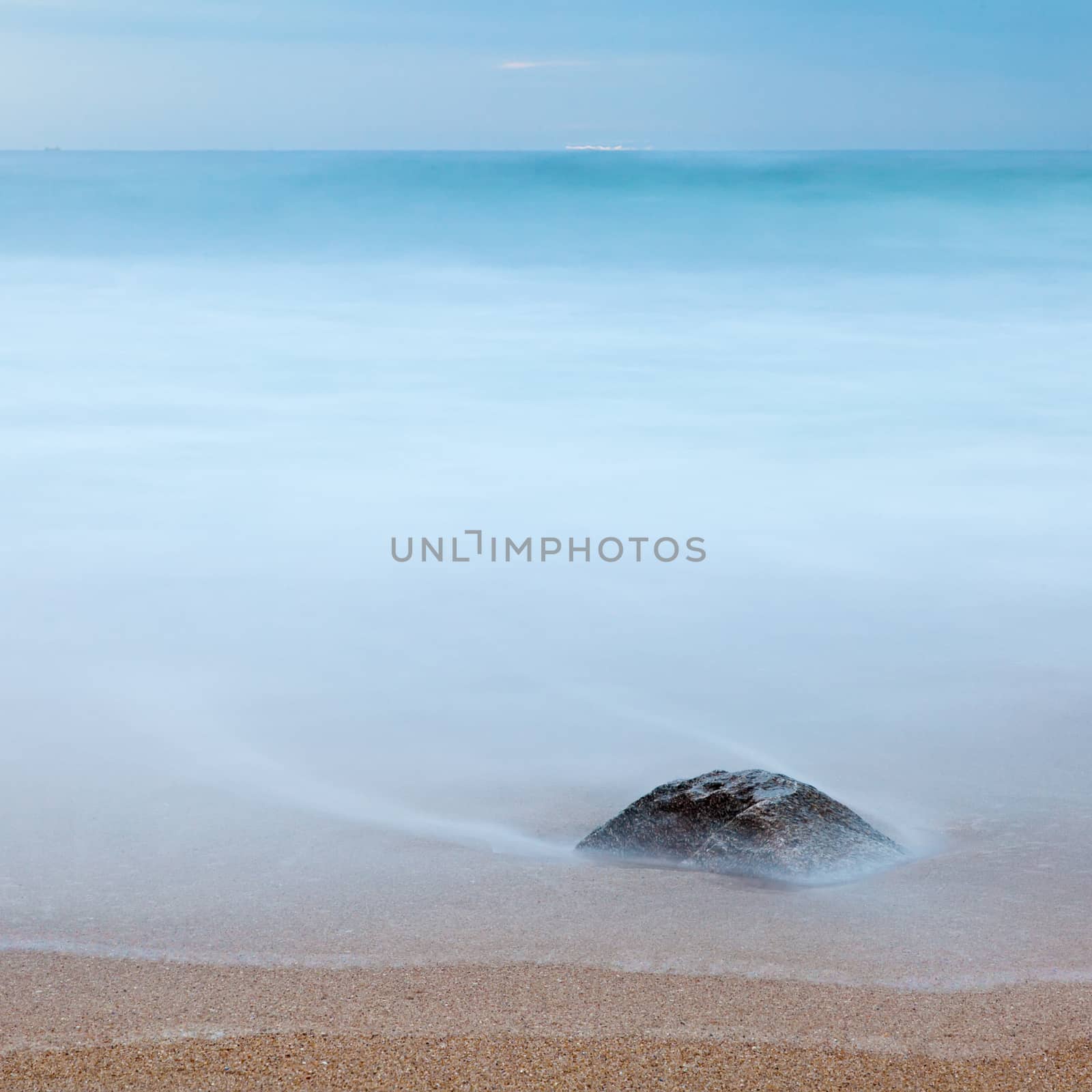 Long Exposure: Rock on the beach by ajn