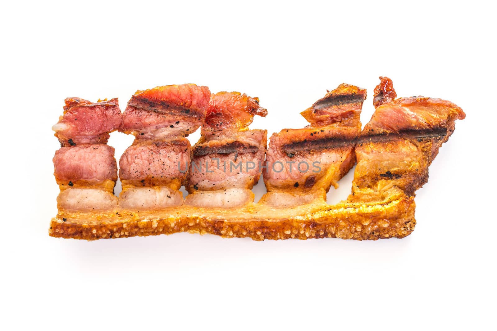 Delicious Rasher of Fried or Grilled Crispy Bacon ready to serve, high key, horizontal shot