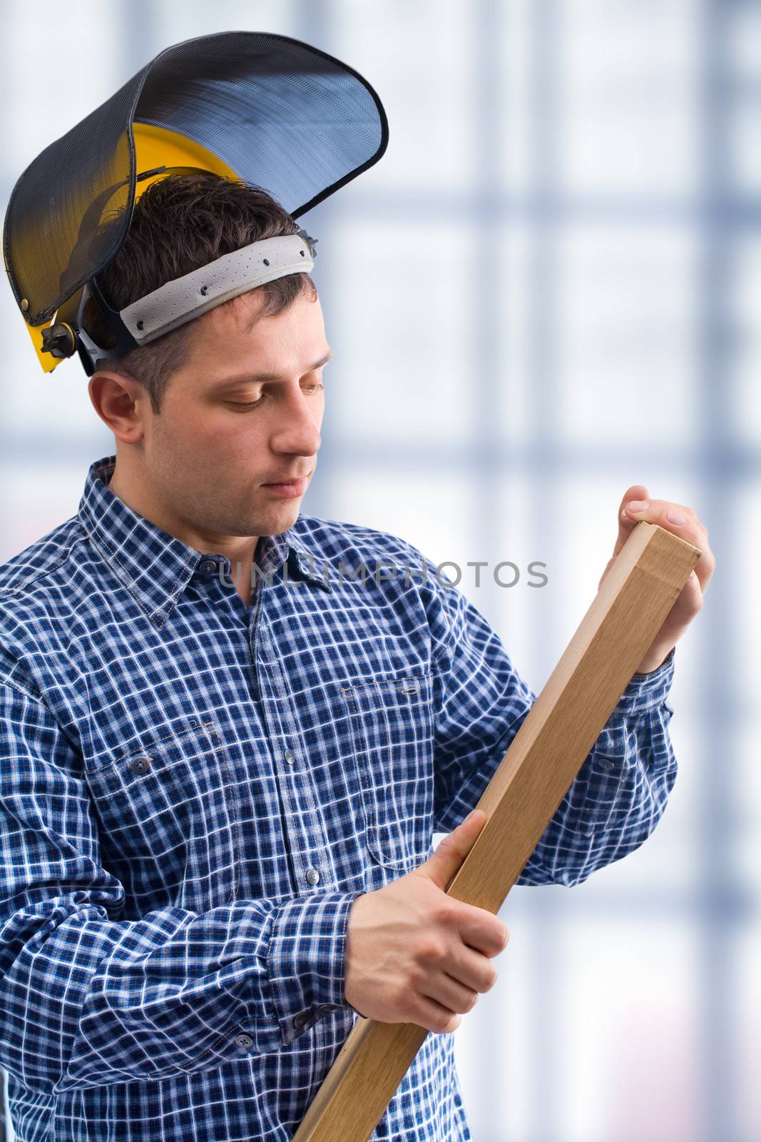 carpenter take the wooden board