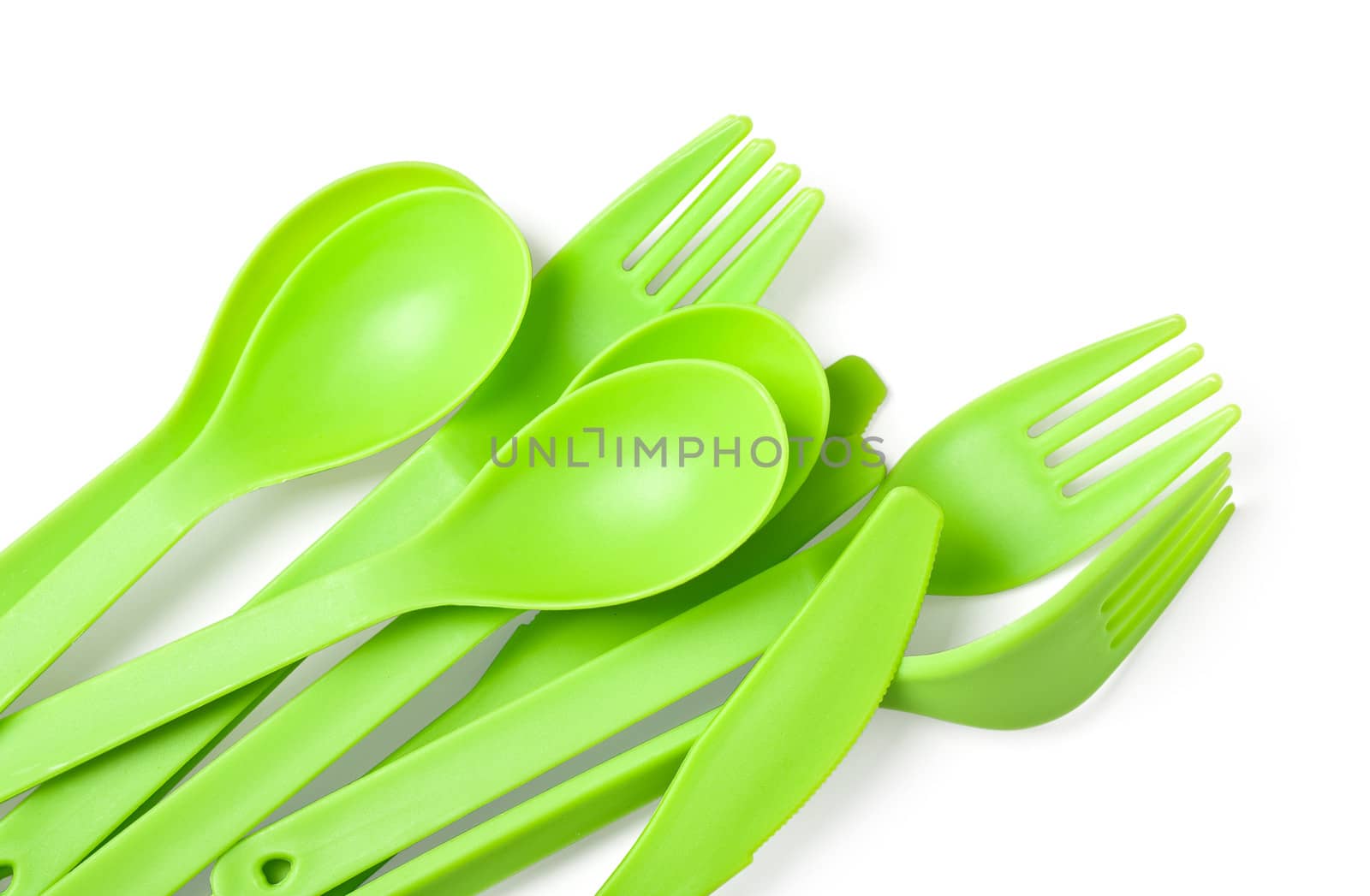 plastic fork, spoon and knife close up isolated on white background. With clipping path