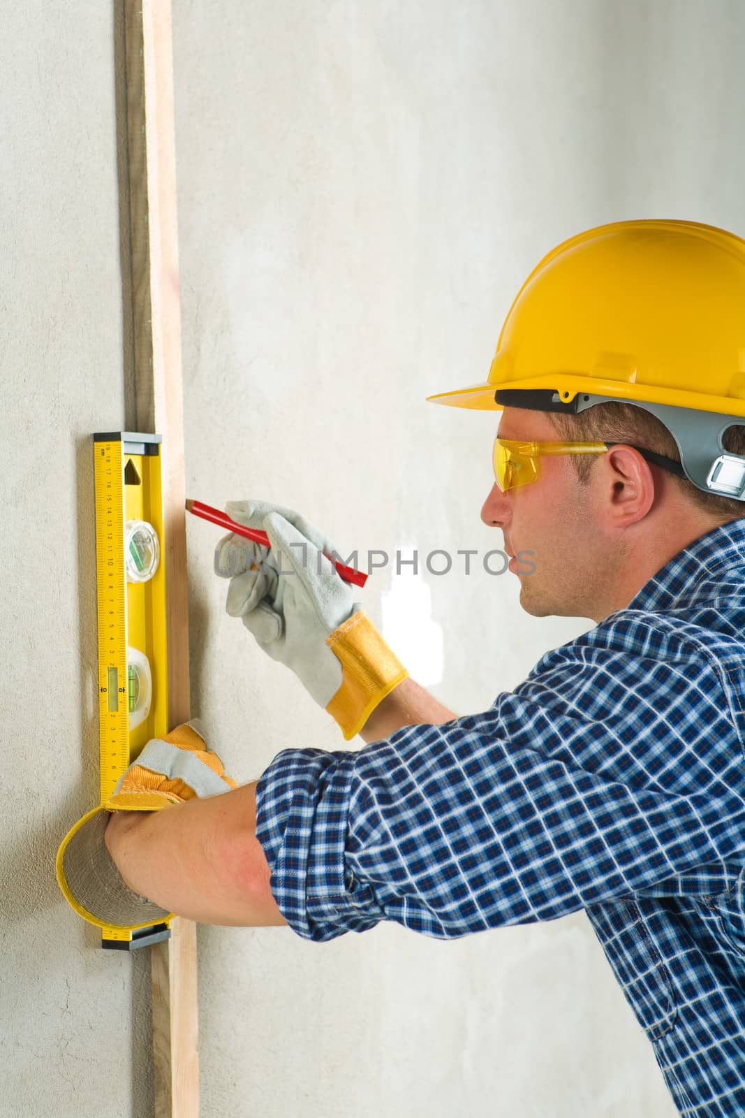 worker at concrette wall