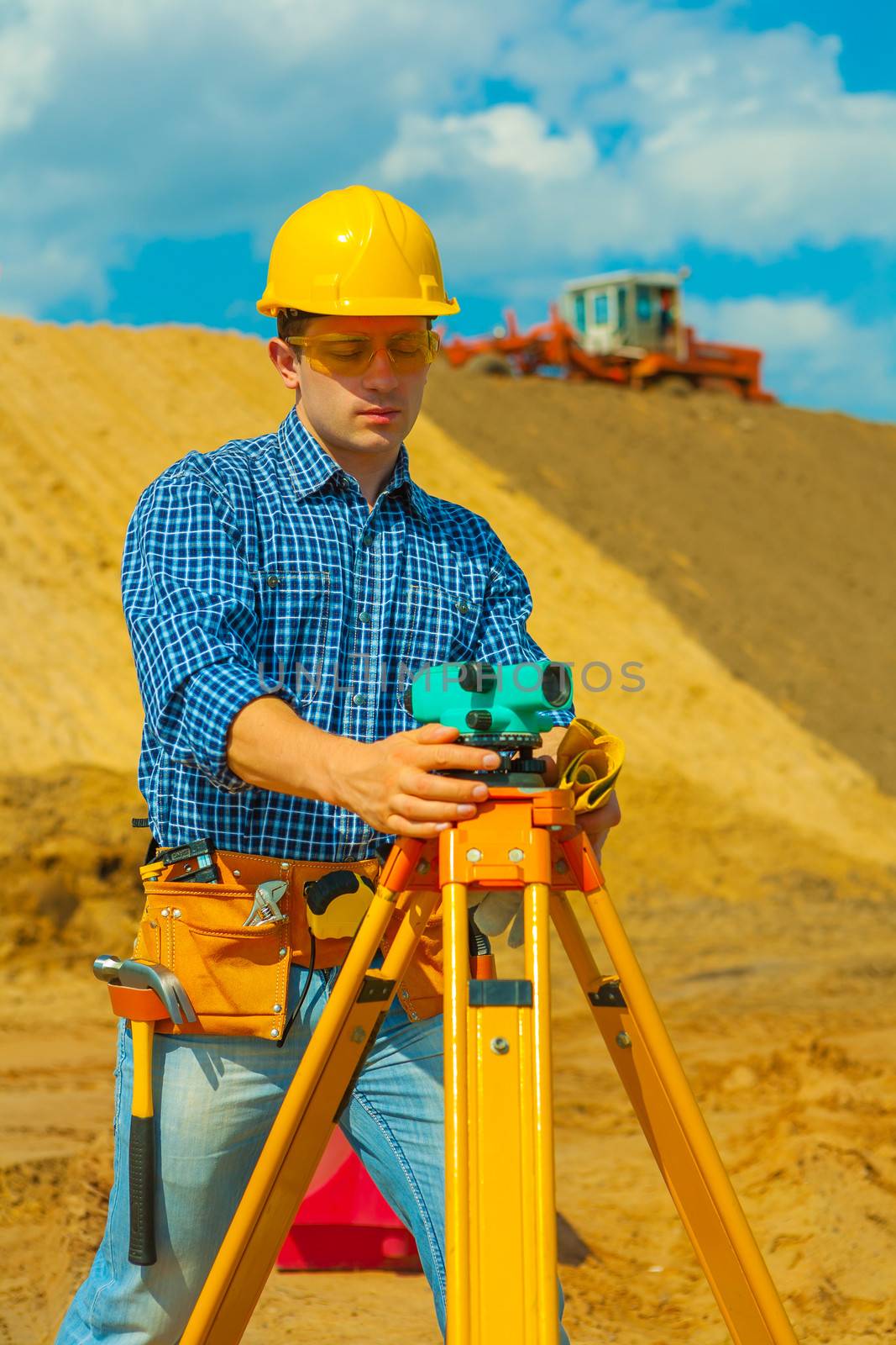 a contractor with theodolite by mihalec