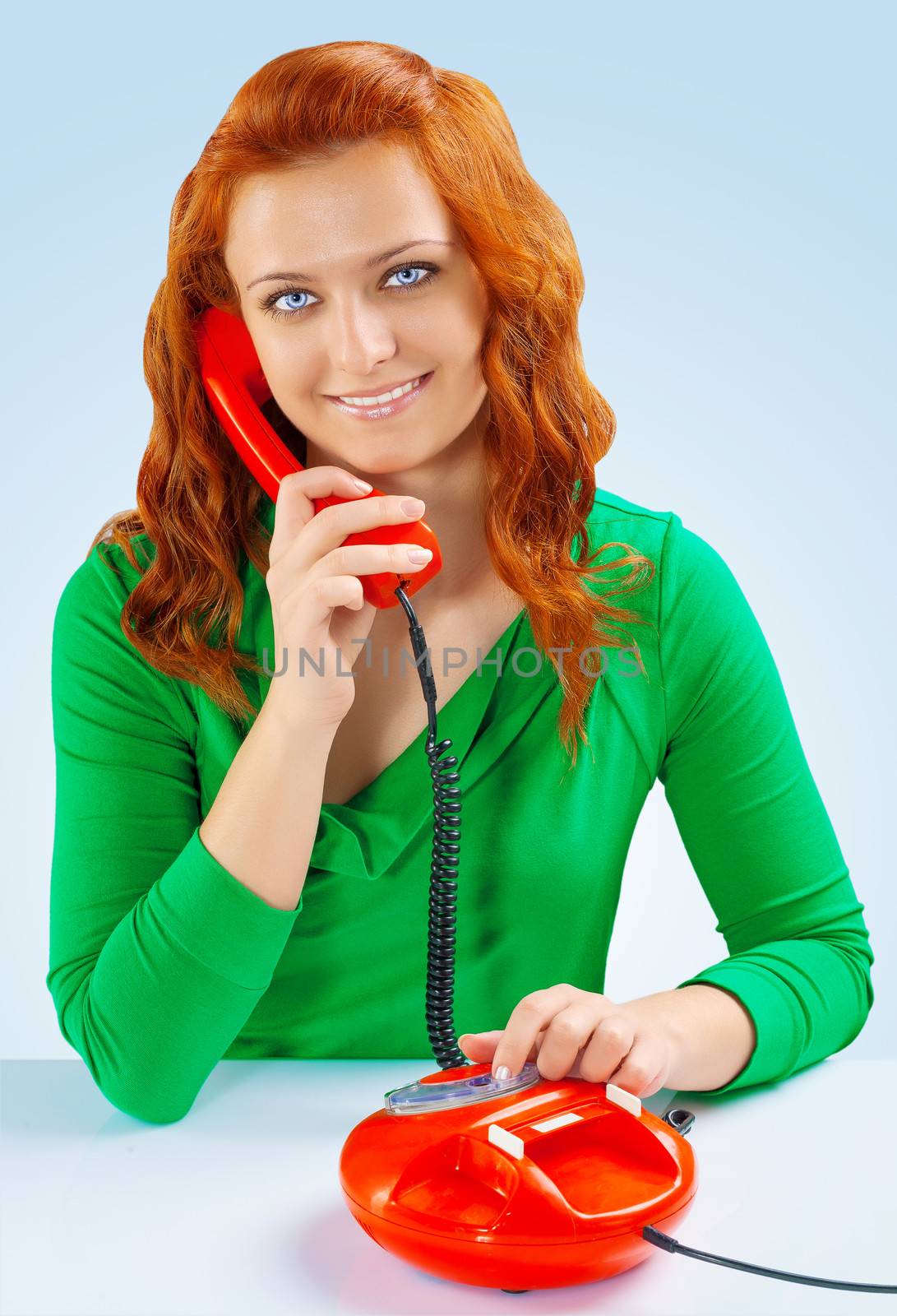 a redhead female fith telephone