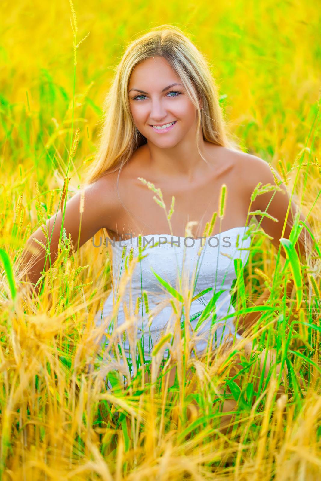 a smiling blonde  on good summer day by mihalec