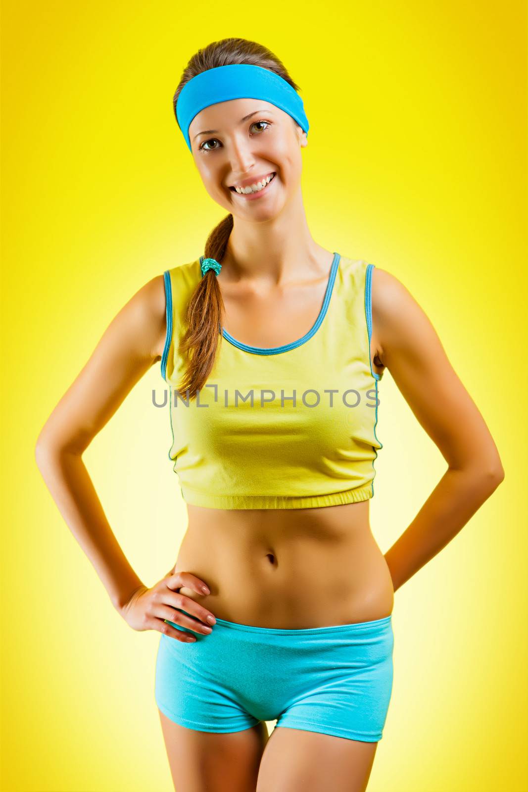 a sporty girl on yellow background by mihalec