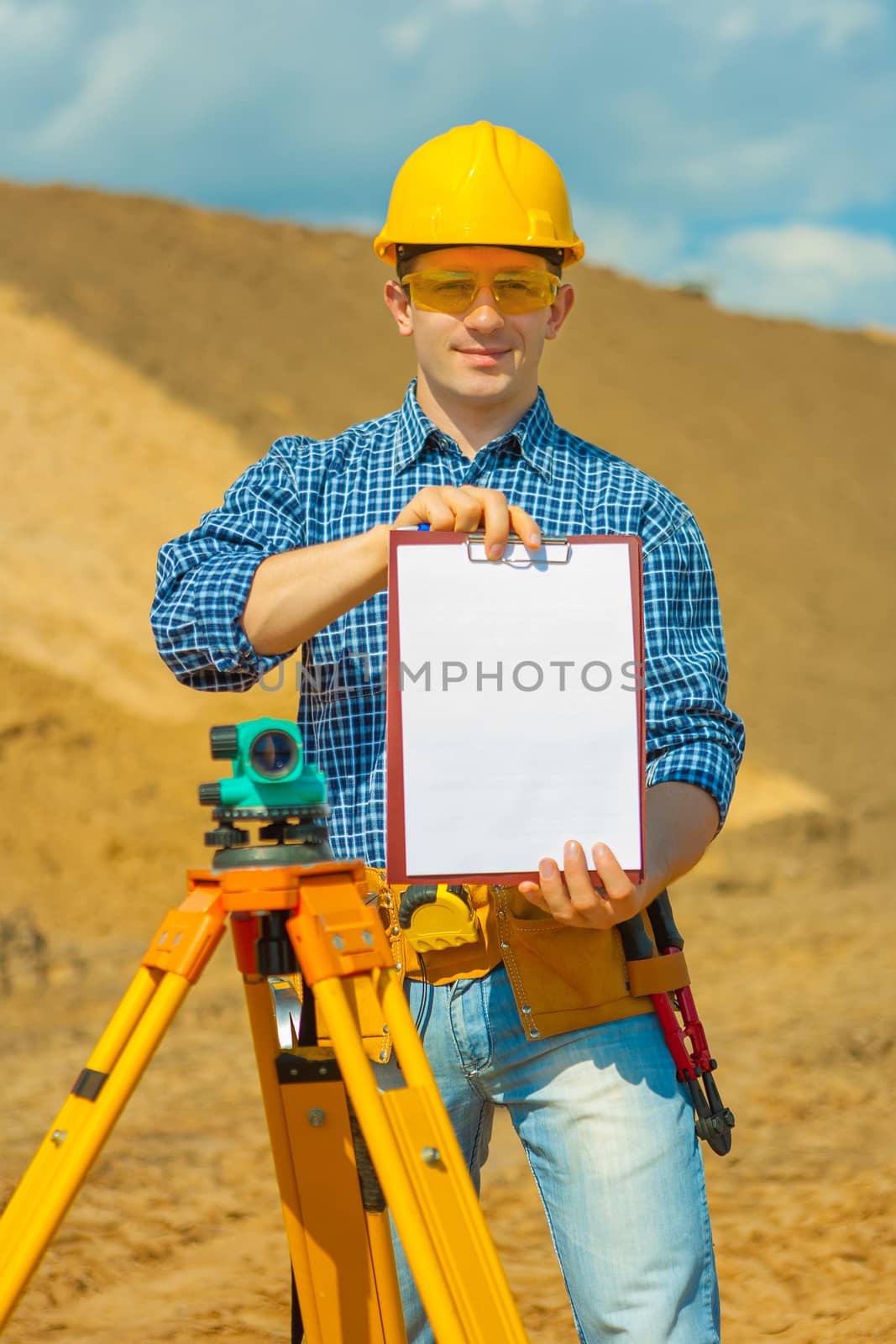 a worker holding empty clipboard