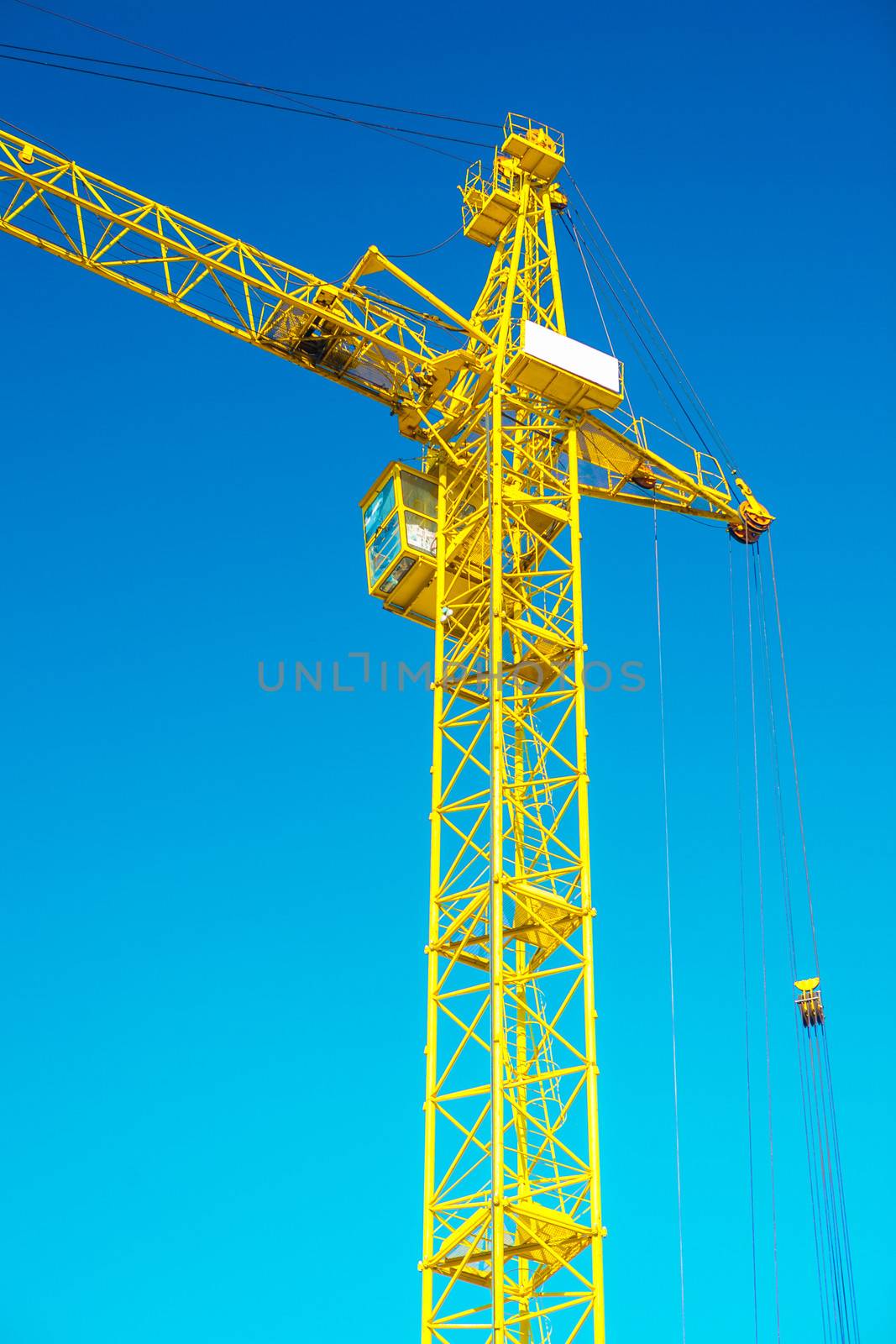 close up view on top of yellow construction crane