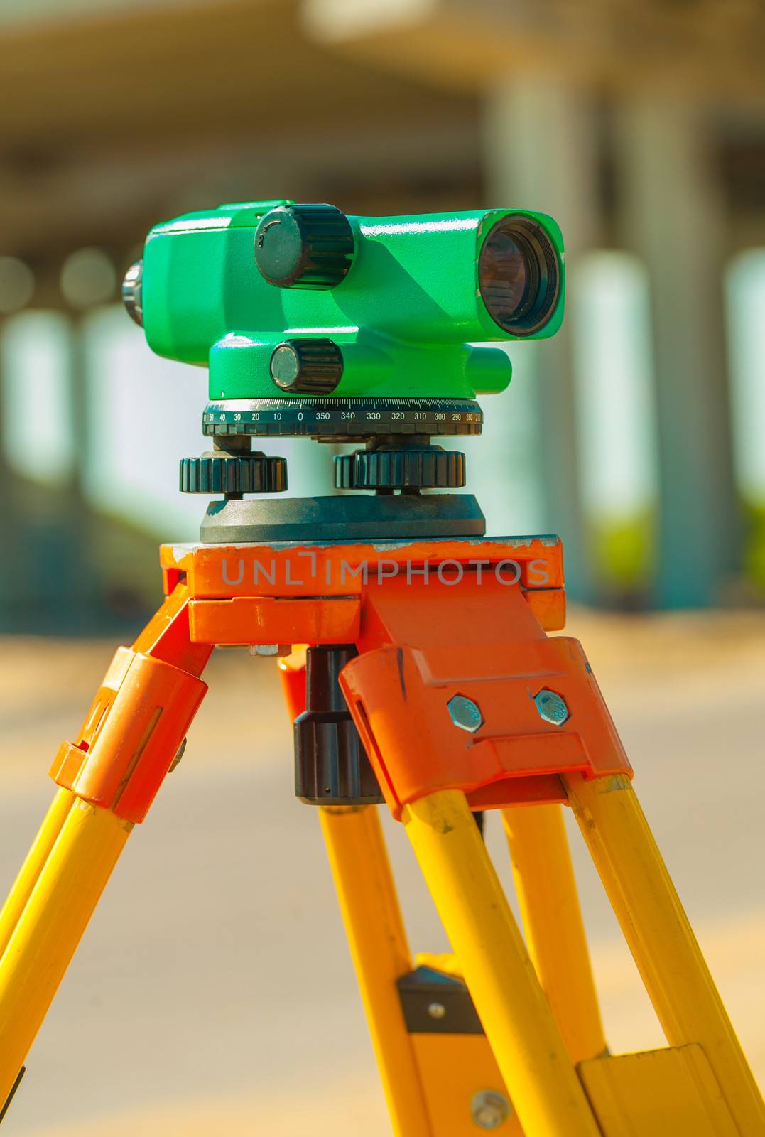 theodolite on construction place close up