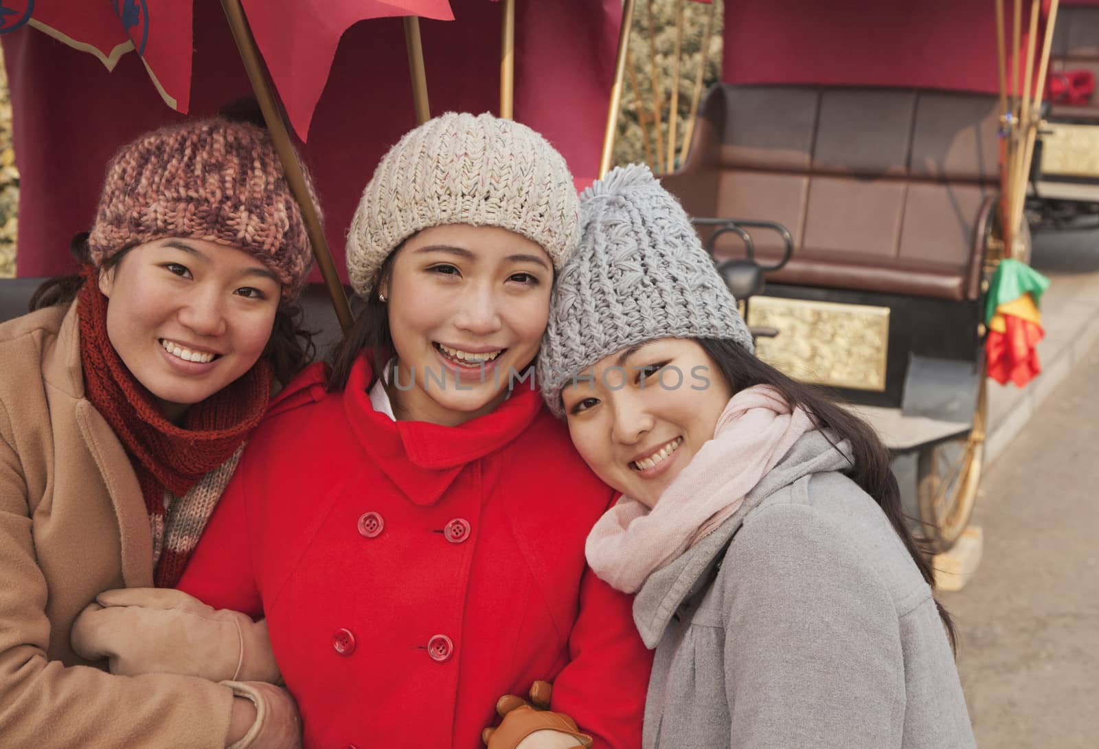 Portrait of three friends outdoors in winter, Beijing by XiXinXing