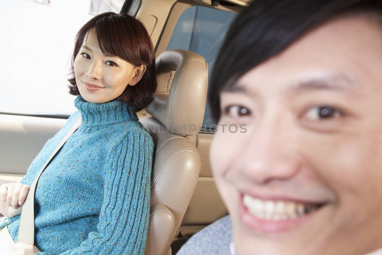 Couple sitting in car, Beijing 