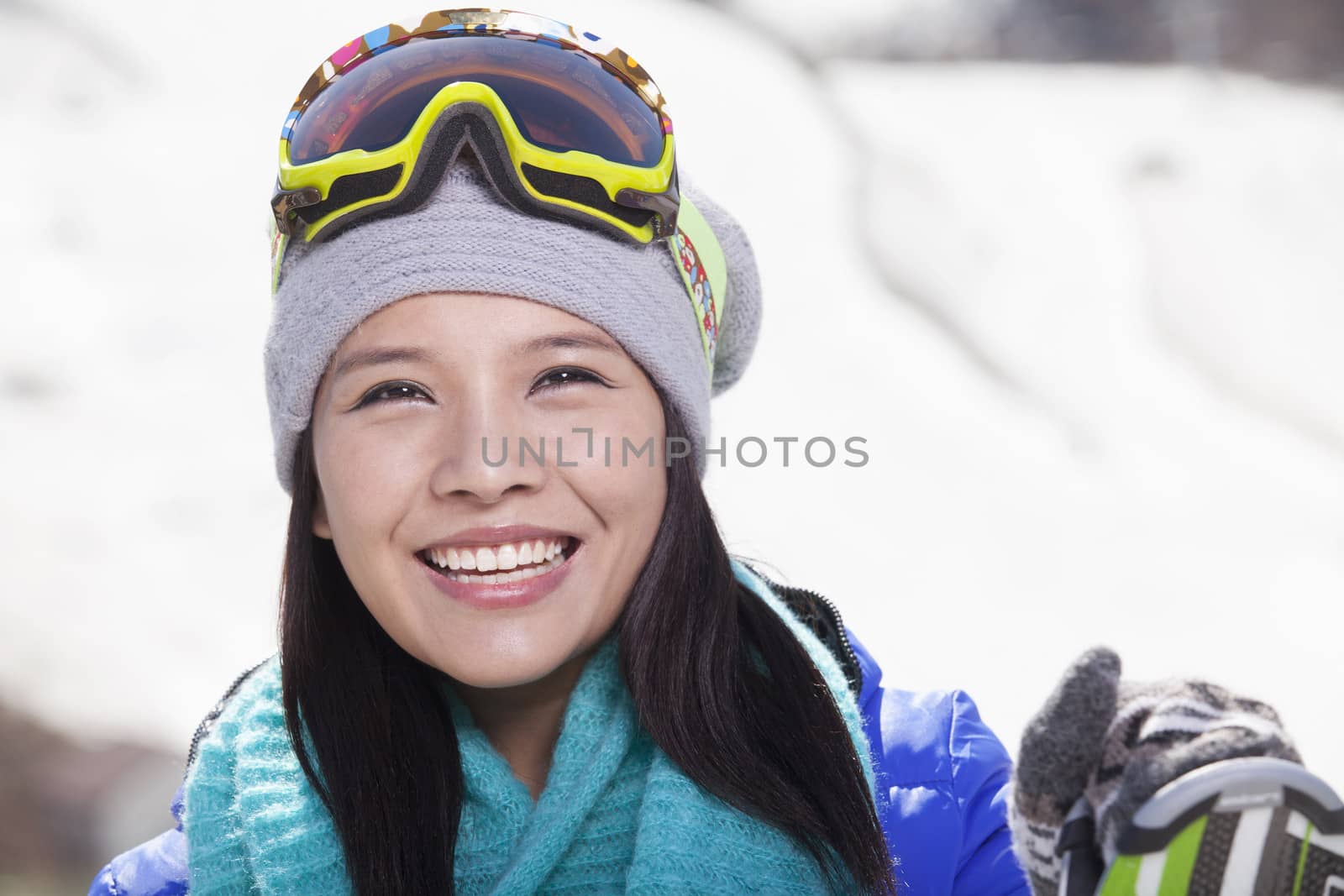 Young Woman Carrying Her Skis