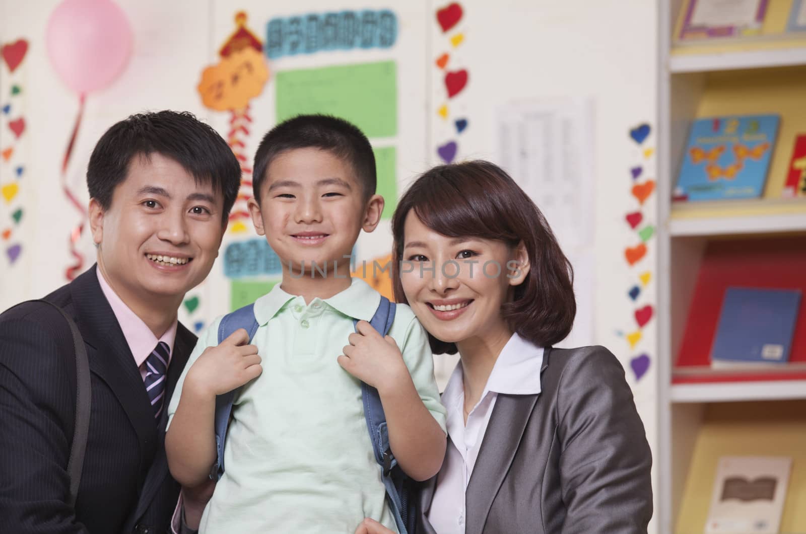 Parents with their Son in Classroom by XiXinXing