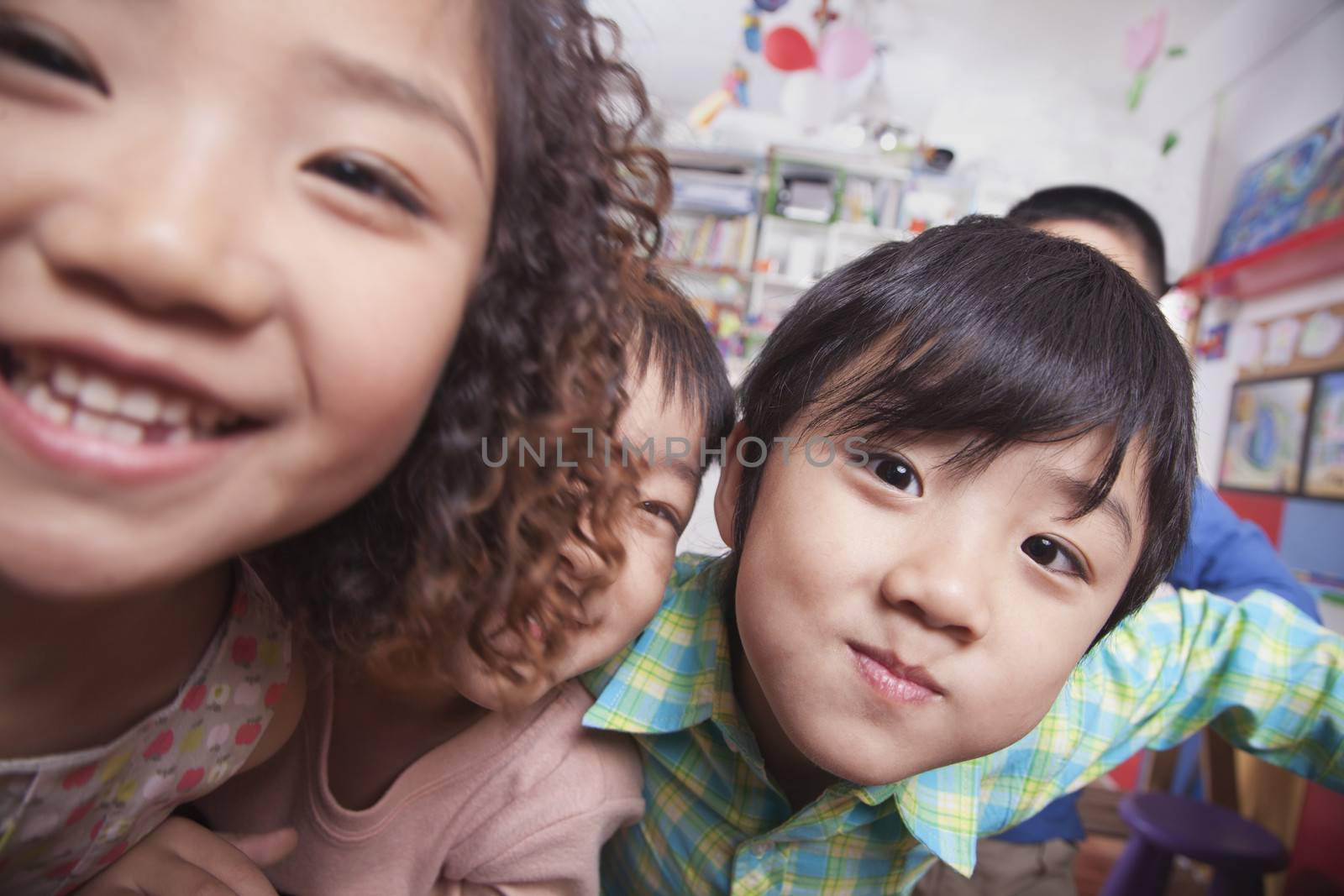 Close Up of a Group of Kids by XiXinXing