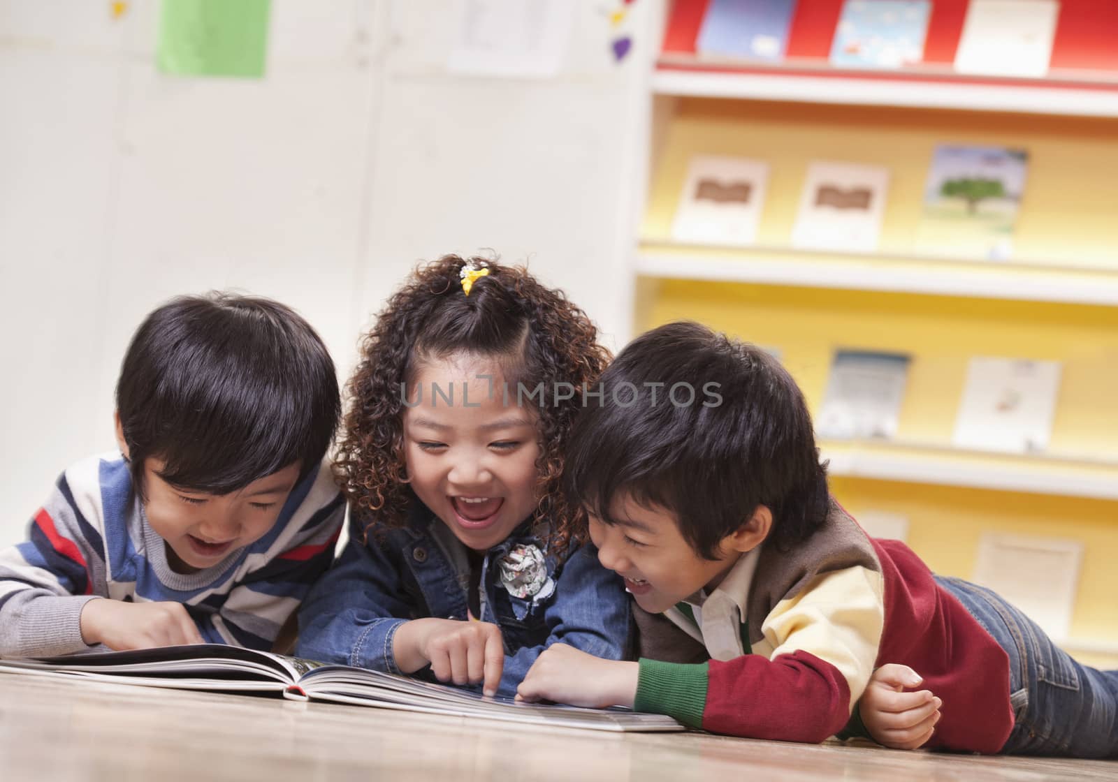 Three Students Reading