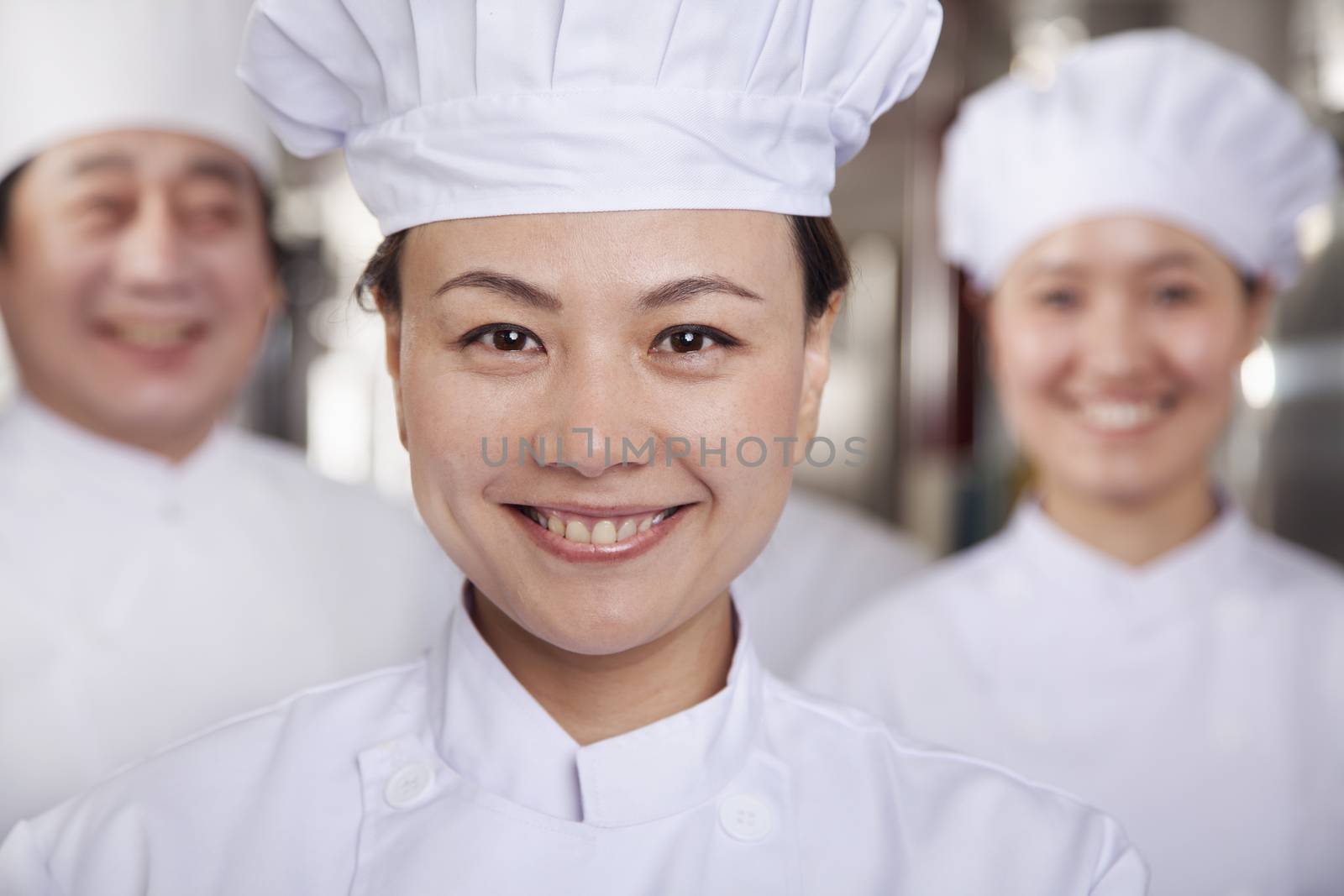 Portrait of a Chef in an Industrial Kitchen