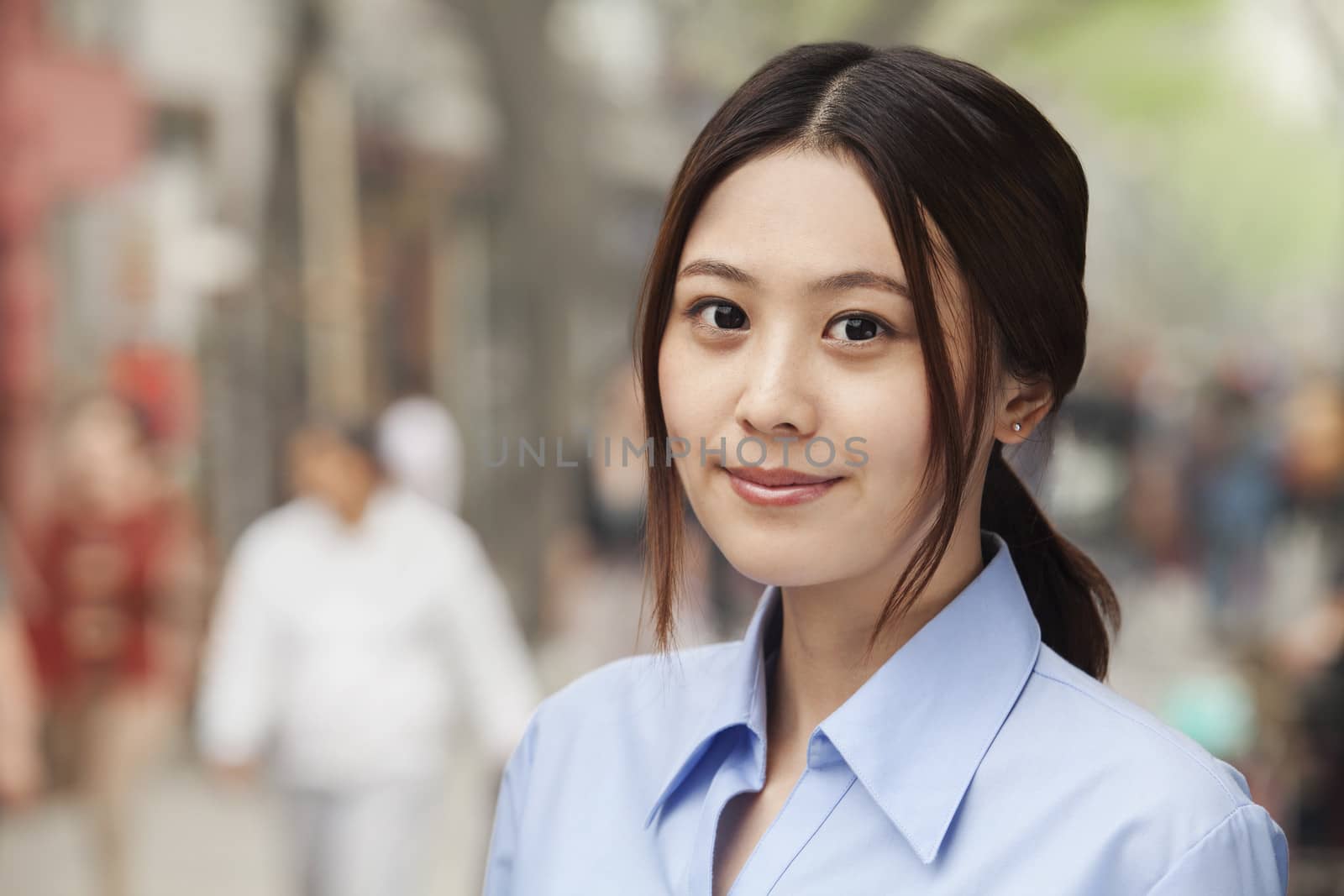 Young Woman smiling and looking at camera