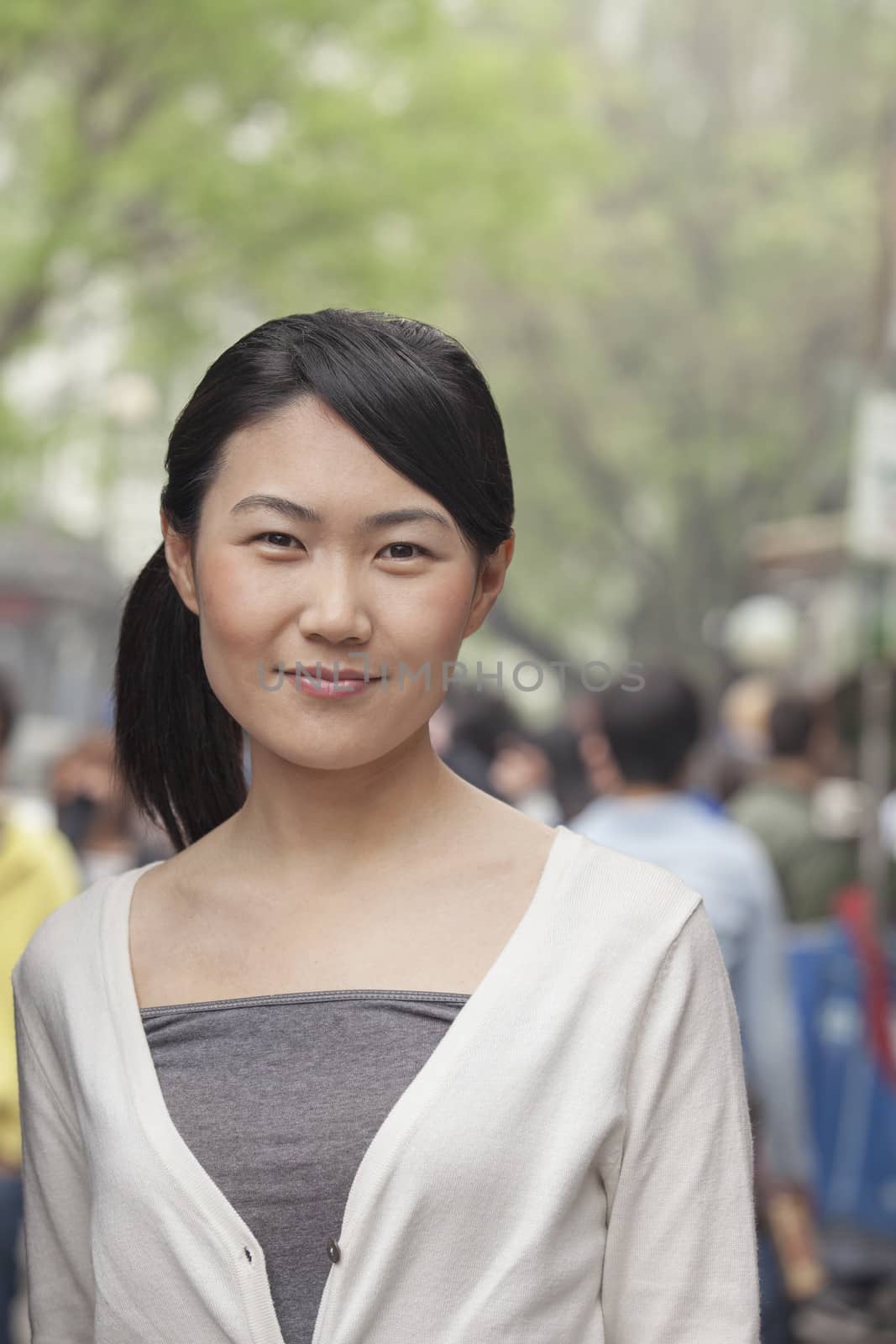 Young Woman smiling looking at camera