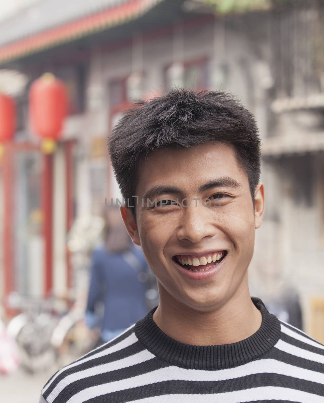 Young Man smiling looking at camera