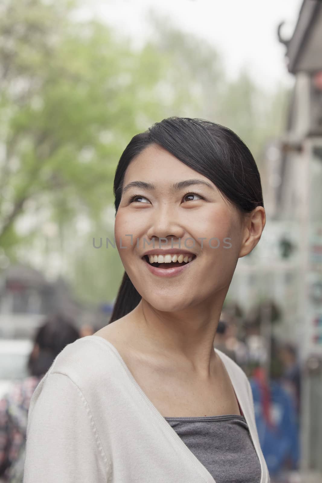 Young Woman smiling looking away