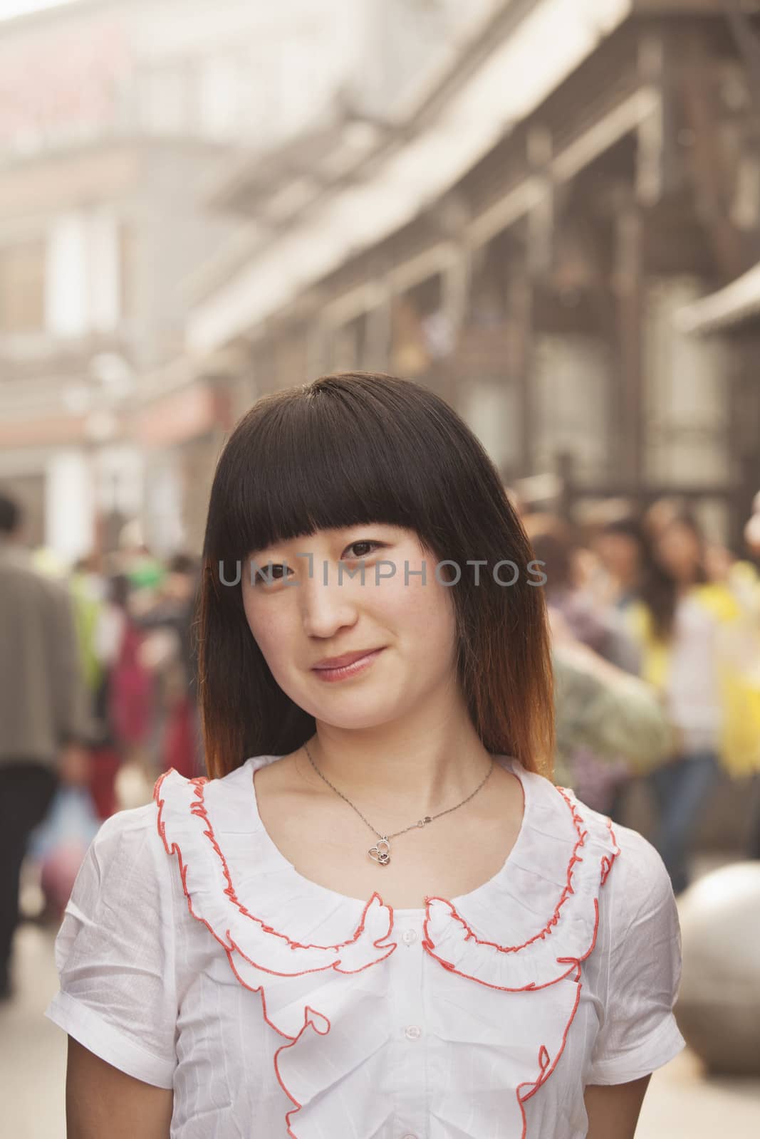 Young Woman smiling and looking at camera