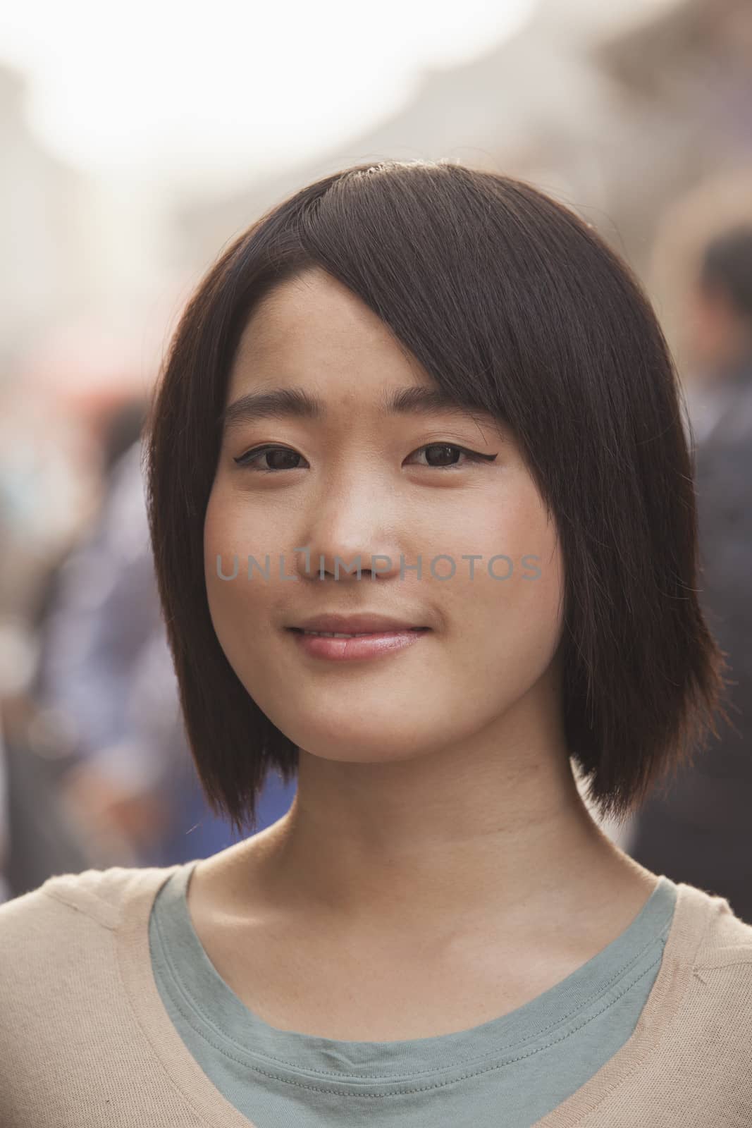 Young Woman smiling and looking at camera