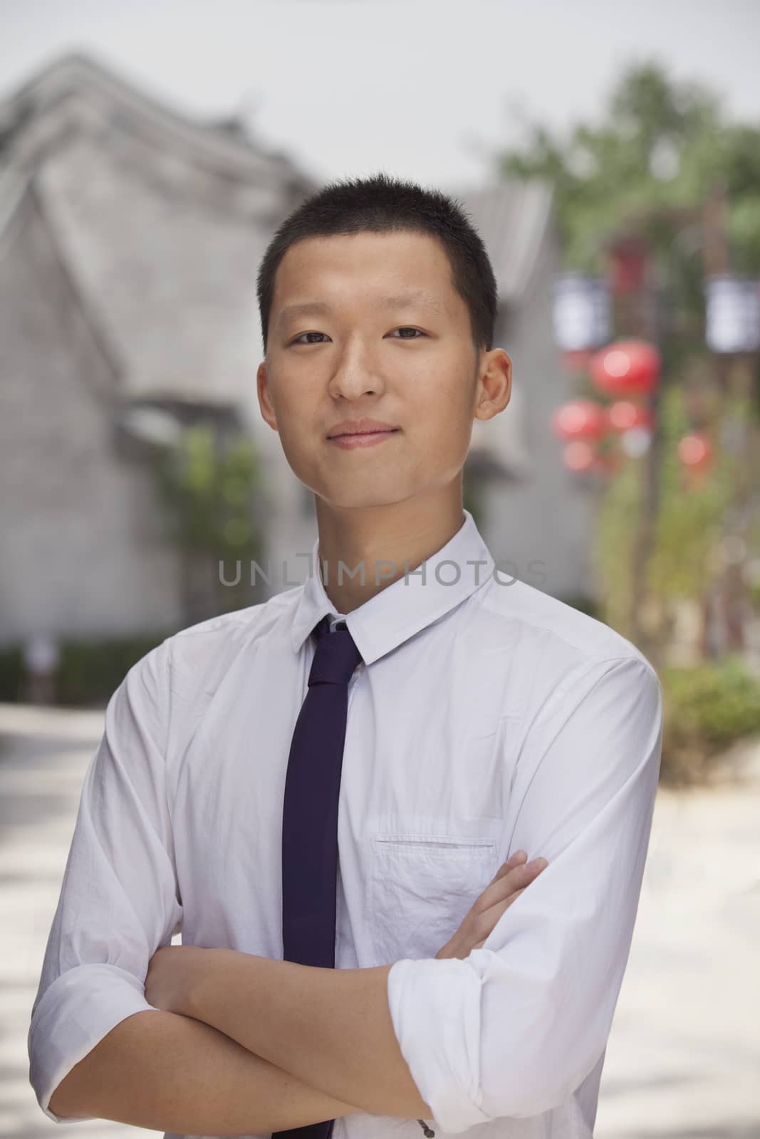 Young Man smiling and looking at camera