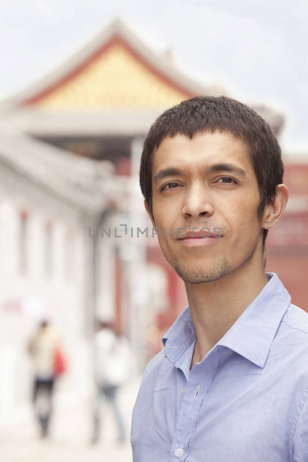 Young Man smiling and looking at camera