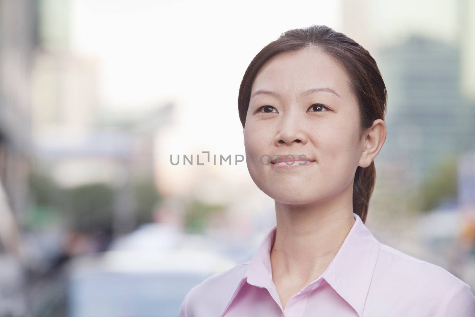 Young Businesswoman outside in Beijing, portrait