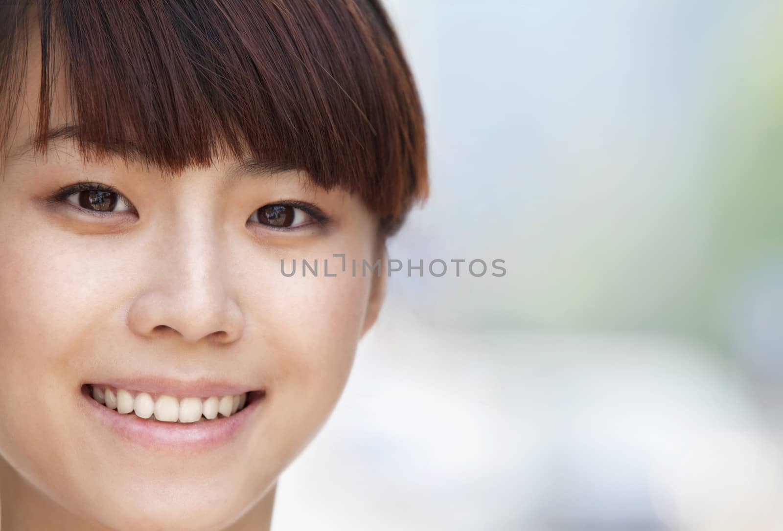 Close-up portrait of young woman smiling in Beijing