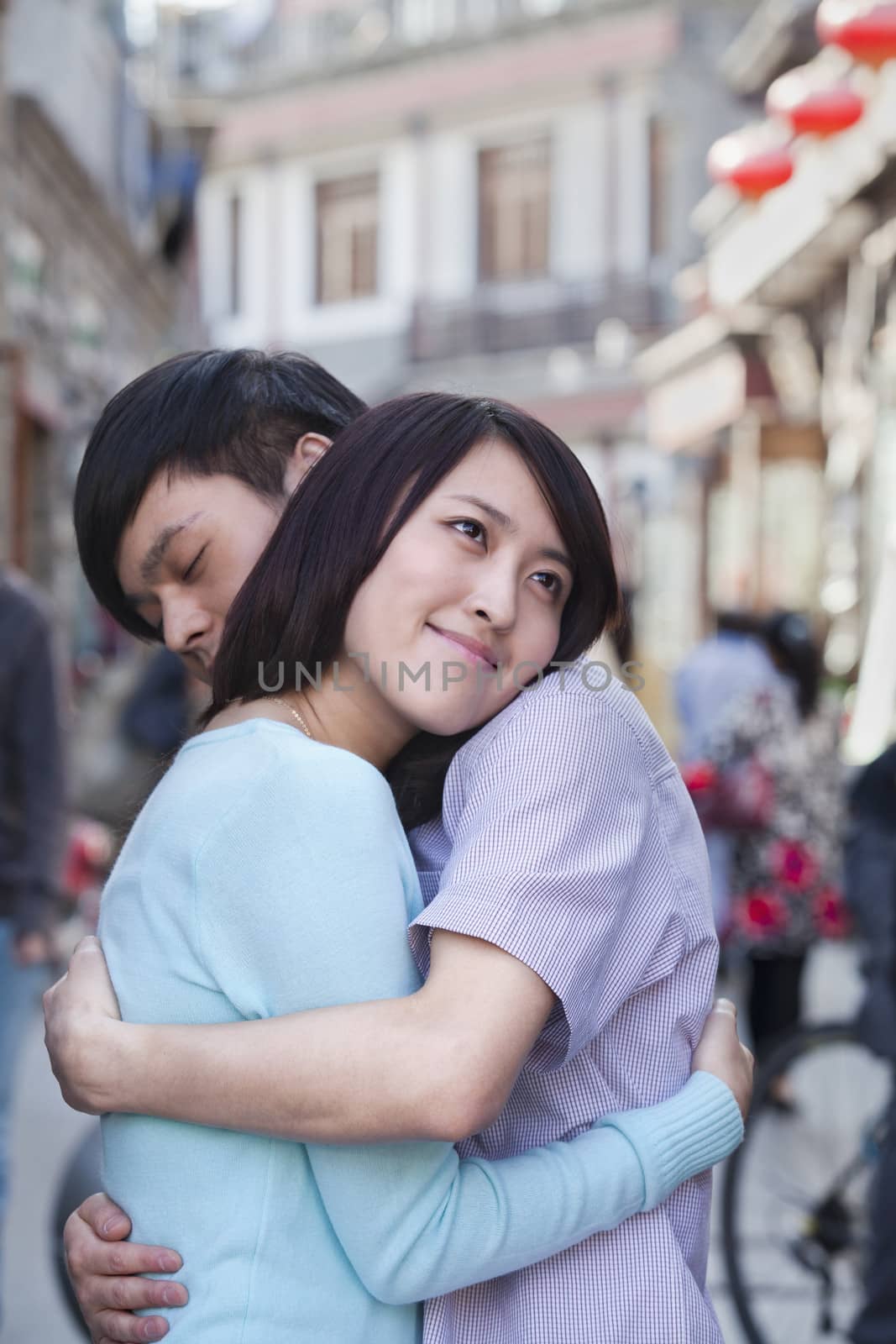 Young Couple Hugging in HouHai Area