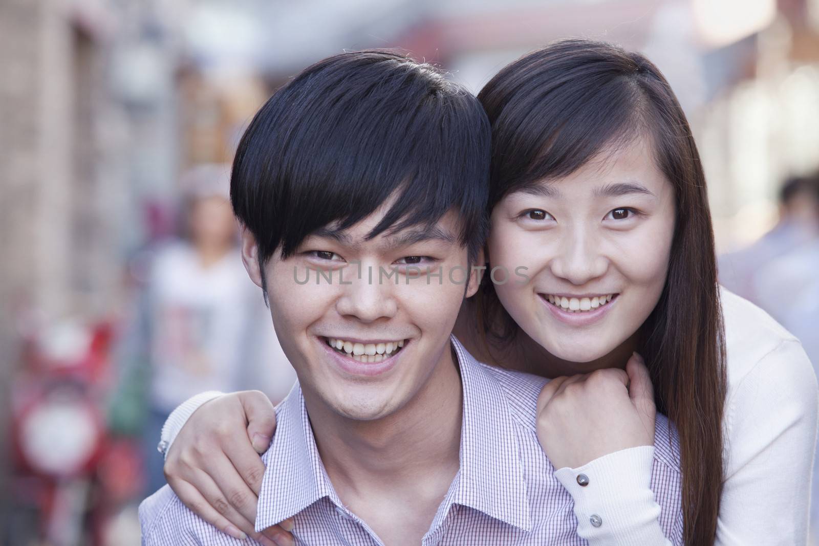 Portrait of Young Heterosexual Couple Smiling in Beijing by XiXinXing