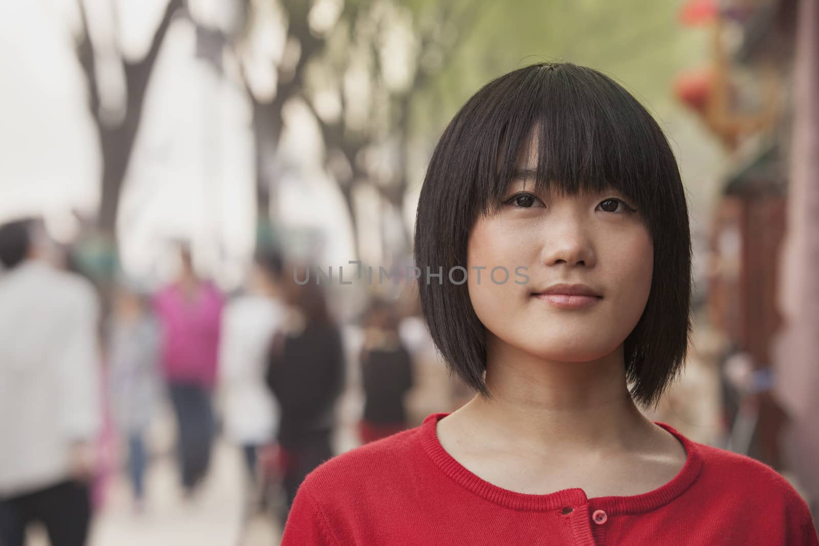 Young Woman smiling and looking at camera