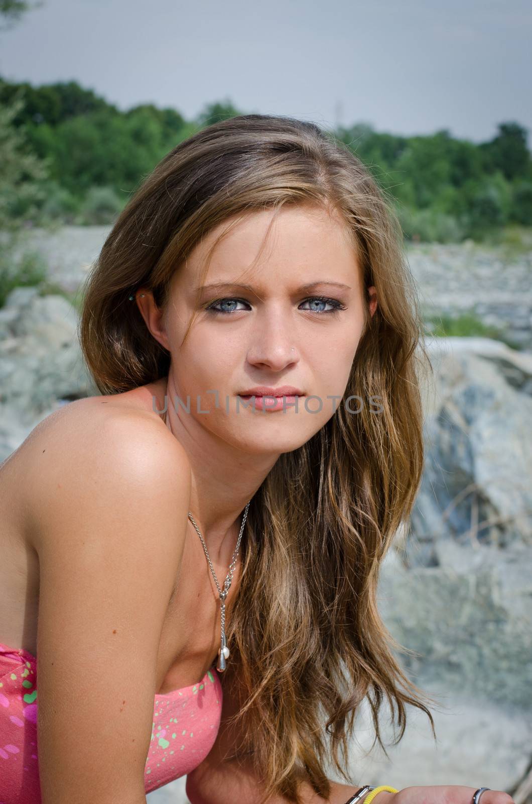 Pretty brunette girl portrait, outdoors by artofphoto