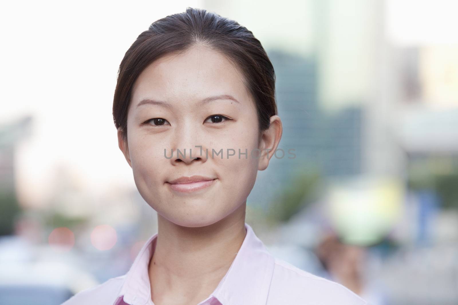 Young Businesswoman outside in Beijing, portrait