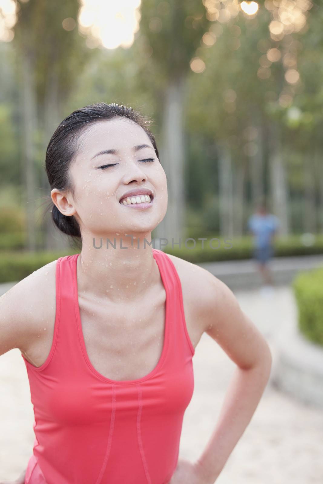 Young Woman After Workout in Park, Beijing,China by XiXinXing