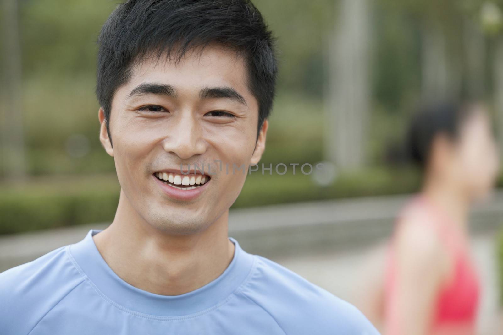 Young Man in exercise clothing in a Park, Beijing, China