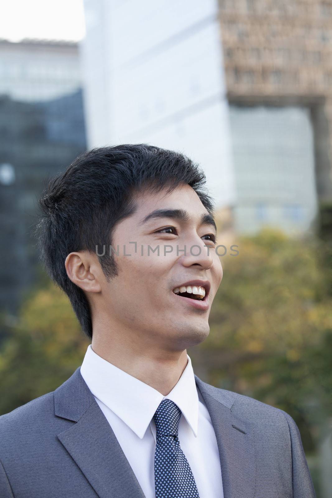 Young Businessman  Looking away by XiXinXing