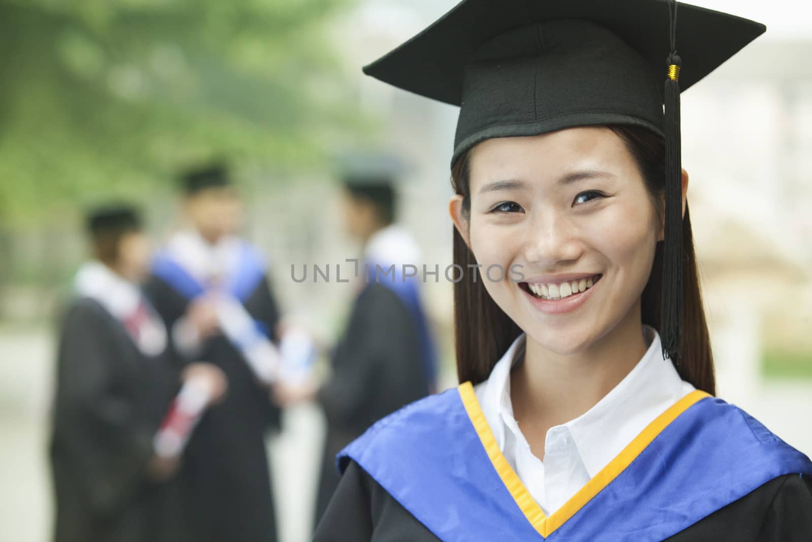 Young Female University Graduate, Close- Up Portrait