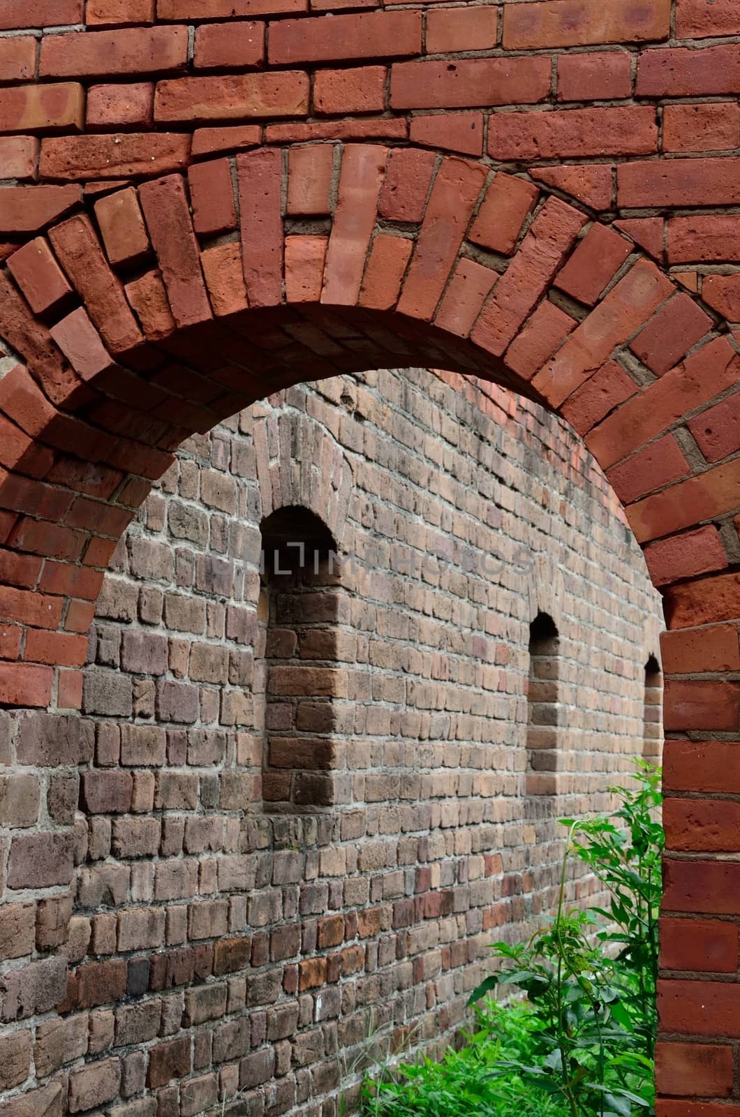 Red brick arch inside Civil war era fort at Fort Clinch State Park in Nassau County, Florida