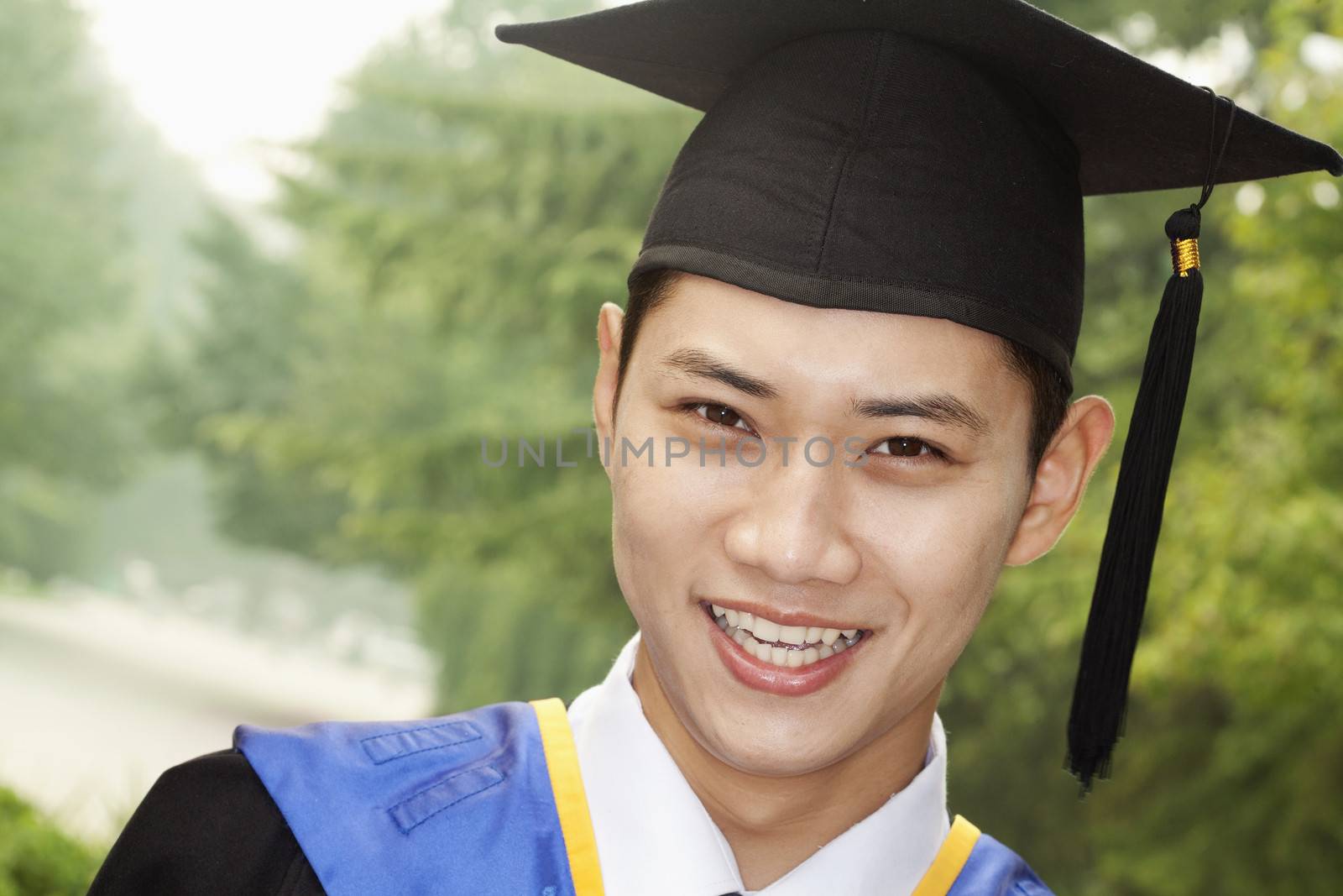 Young Man Graduating From University, Close-Up Portrait