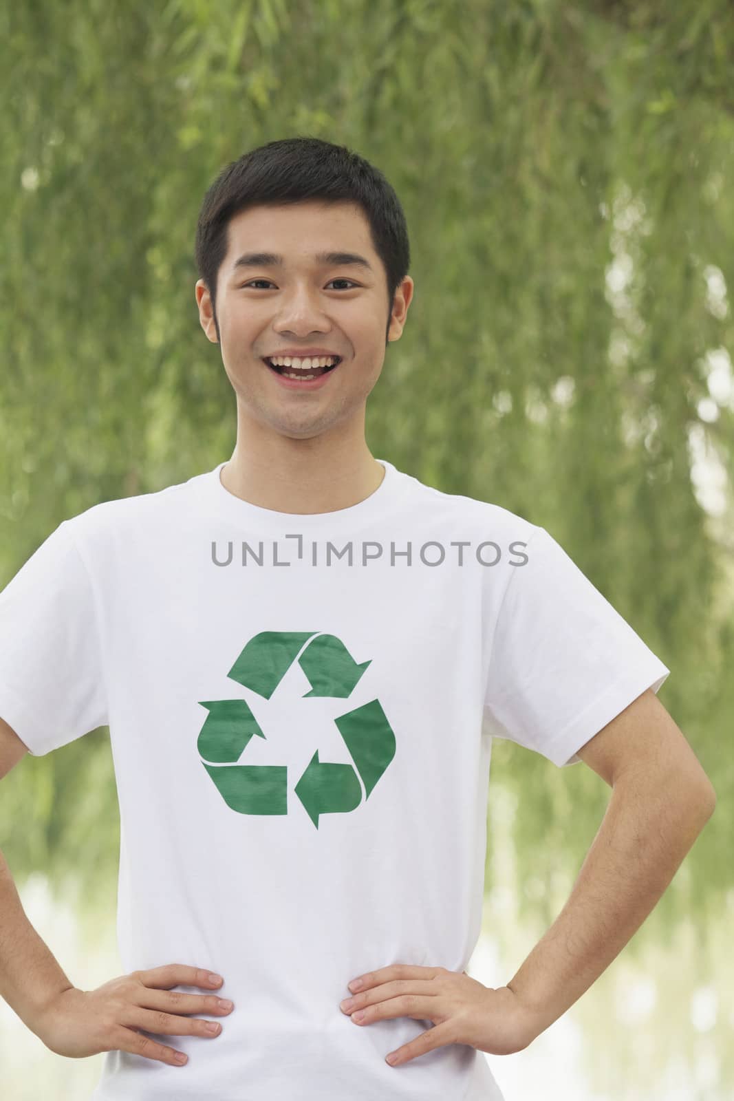 Young Man Smiling, Recycling Symbol, Beijing by XiXinXing
