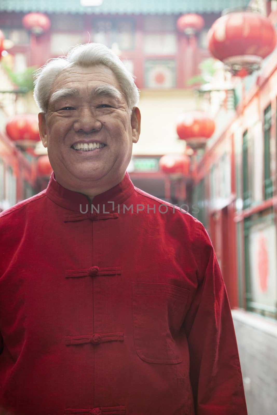 Portrait of senior man in Chinese traditional clothing