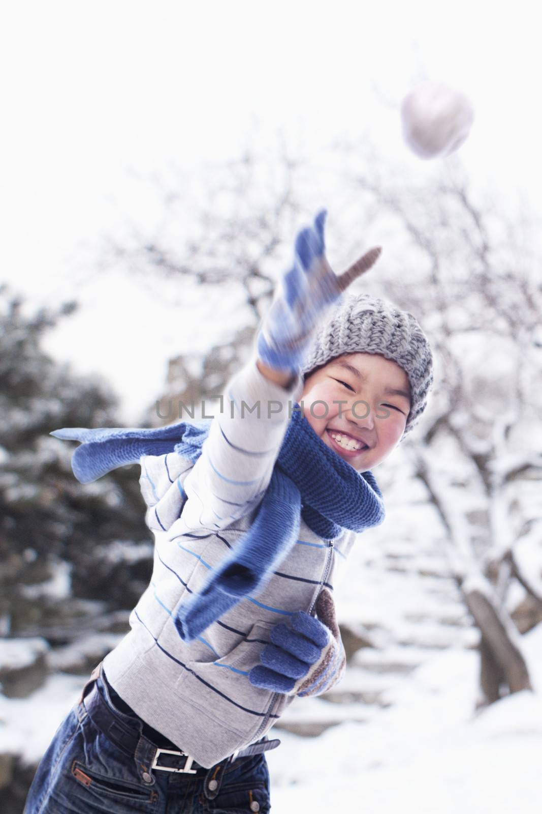 Boy playing in the snow by XiXinXing